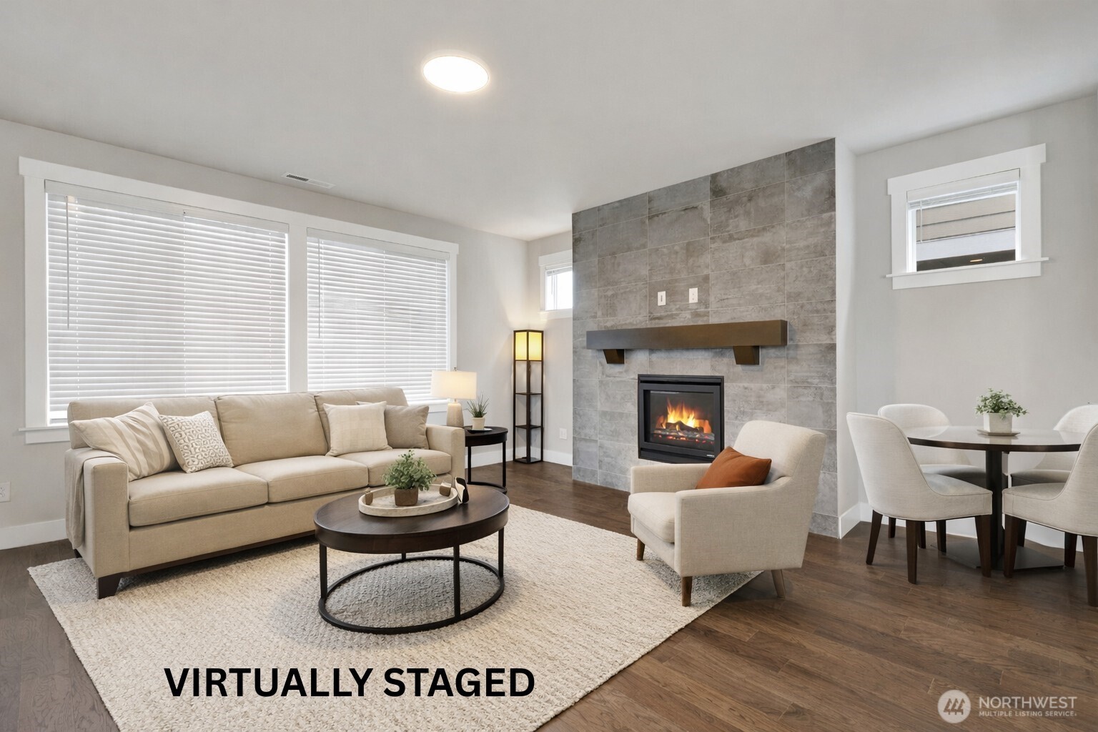 Huge great room with gas fireplace and view of bonus office nook!