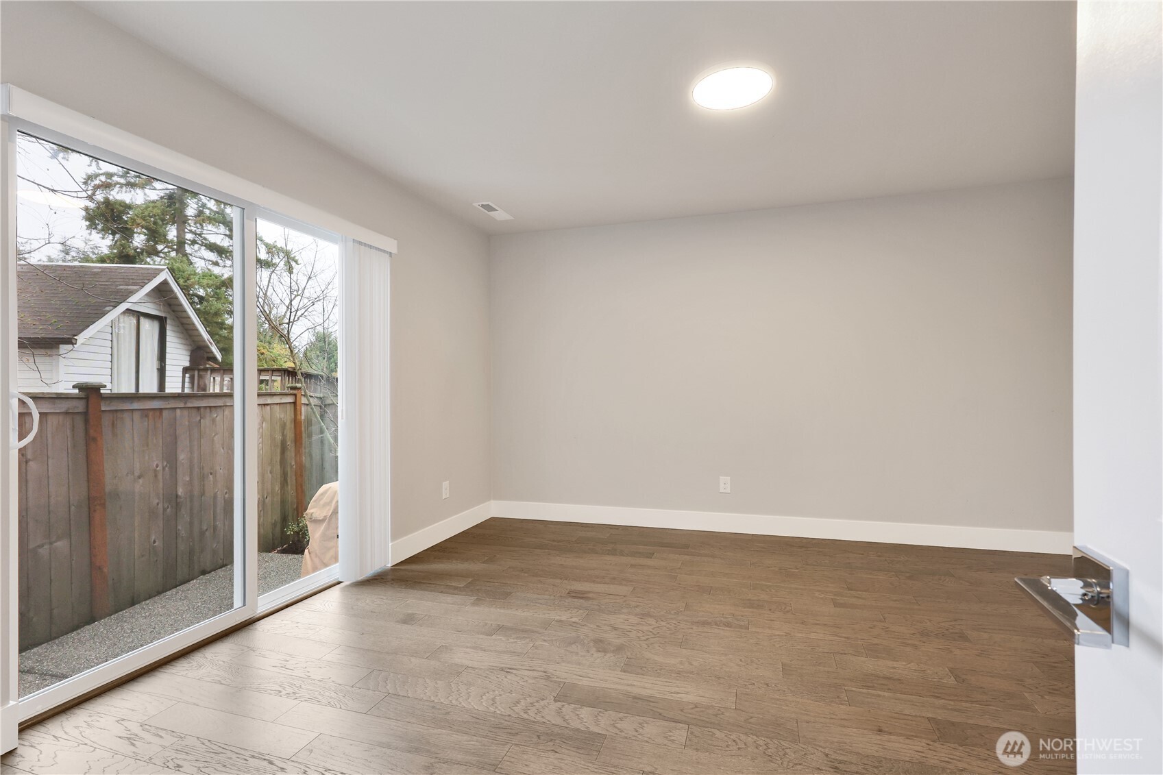 Downstairs bedroom with sliding glass door!