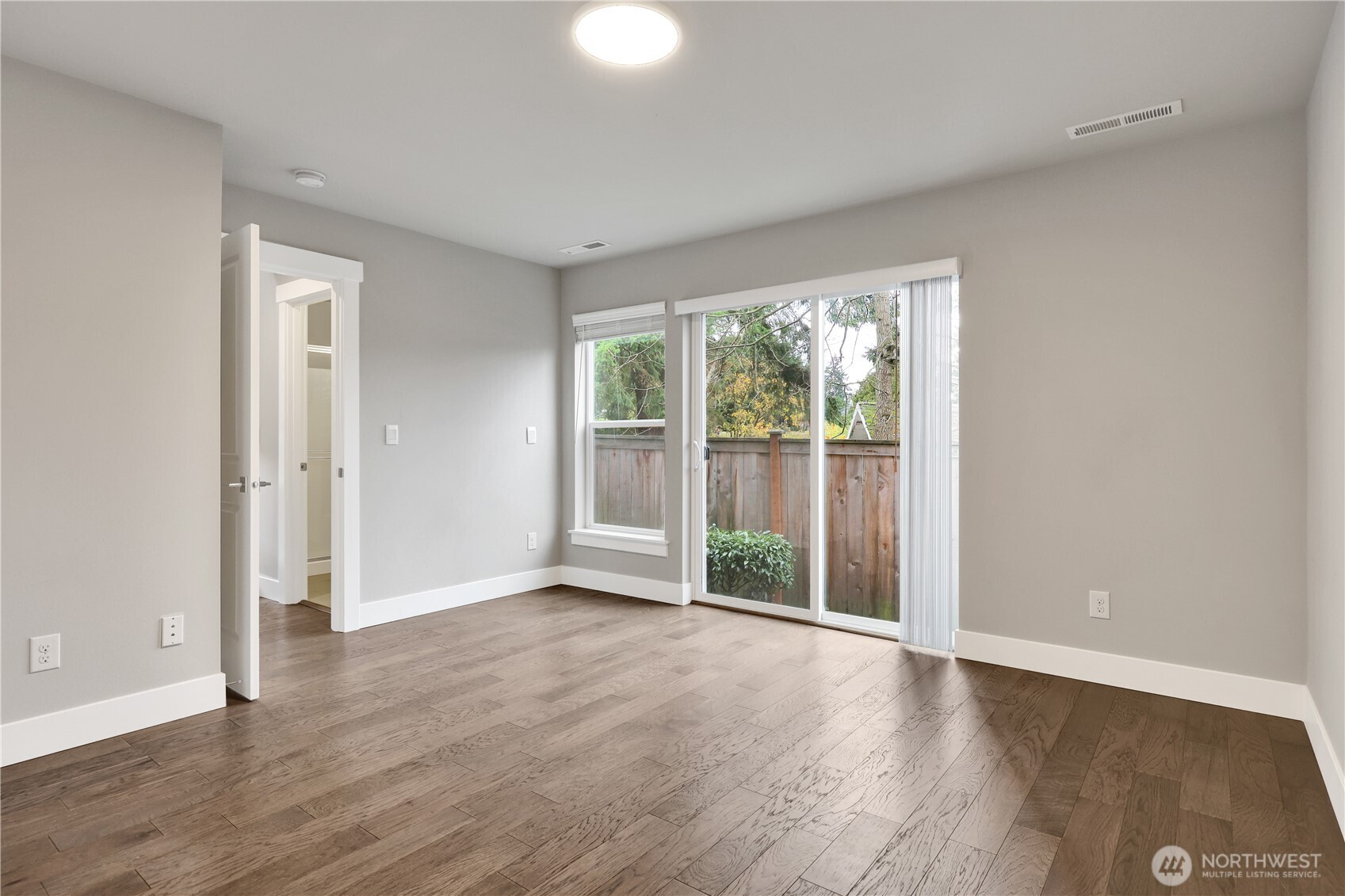 Downstairs bedroom with sliding glass door!