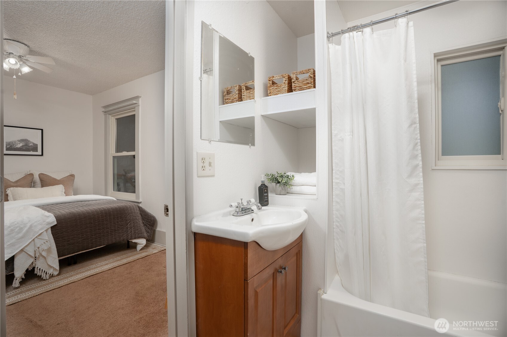 The second bathroom offers convenient access from the dining area or directly from the second bedroom.