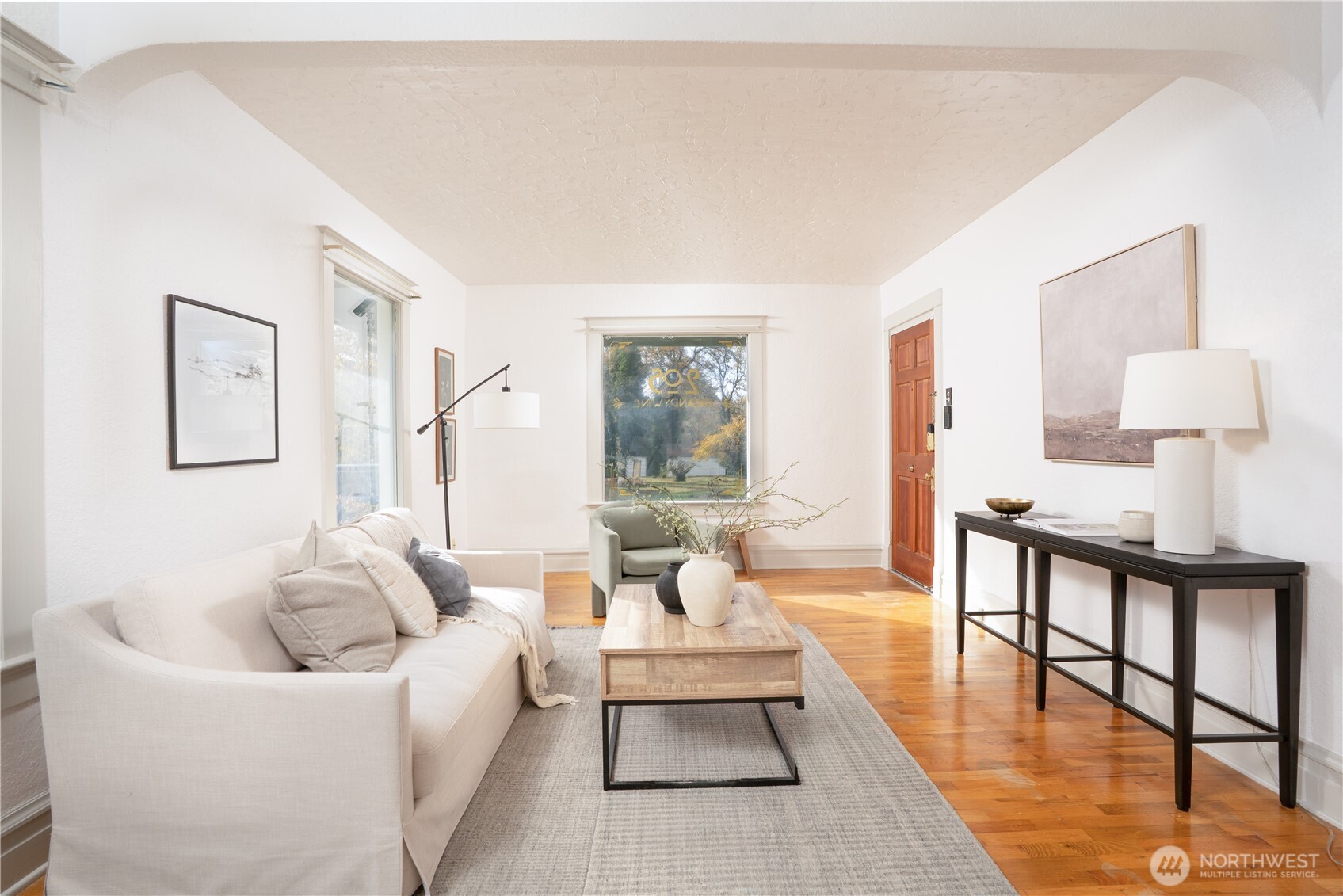 Large windows all along the living space. Many of the windows in the home have been replaced.