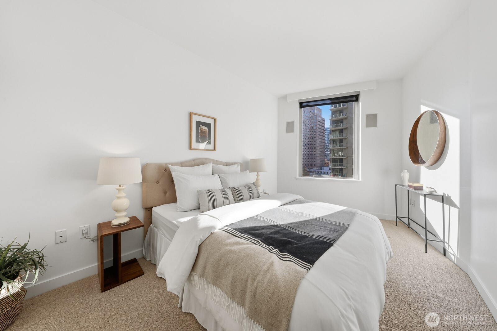 The primary bedroom is exceptionally spacious, providing ample room for personal decor ideas, and includes a large walk-in closet.