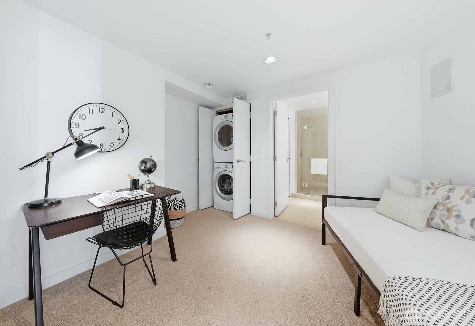 A flexible space that can be utilized as a second bedroom, office, yoga/meditation room, or personal gym.