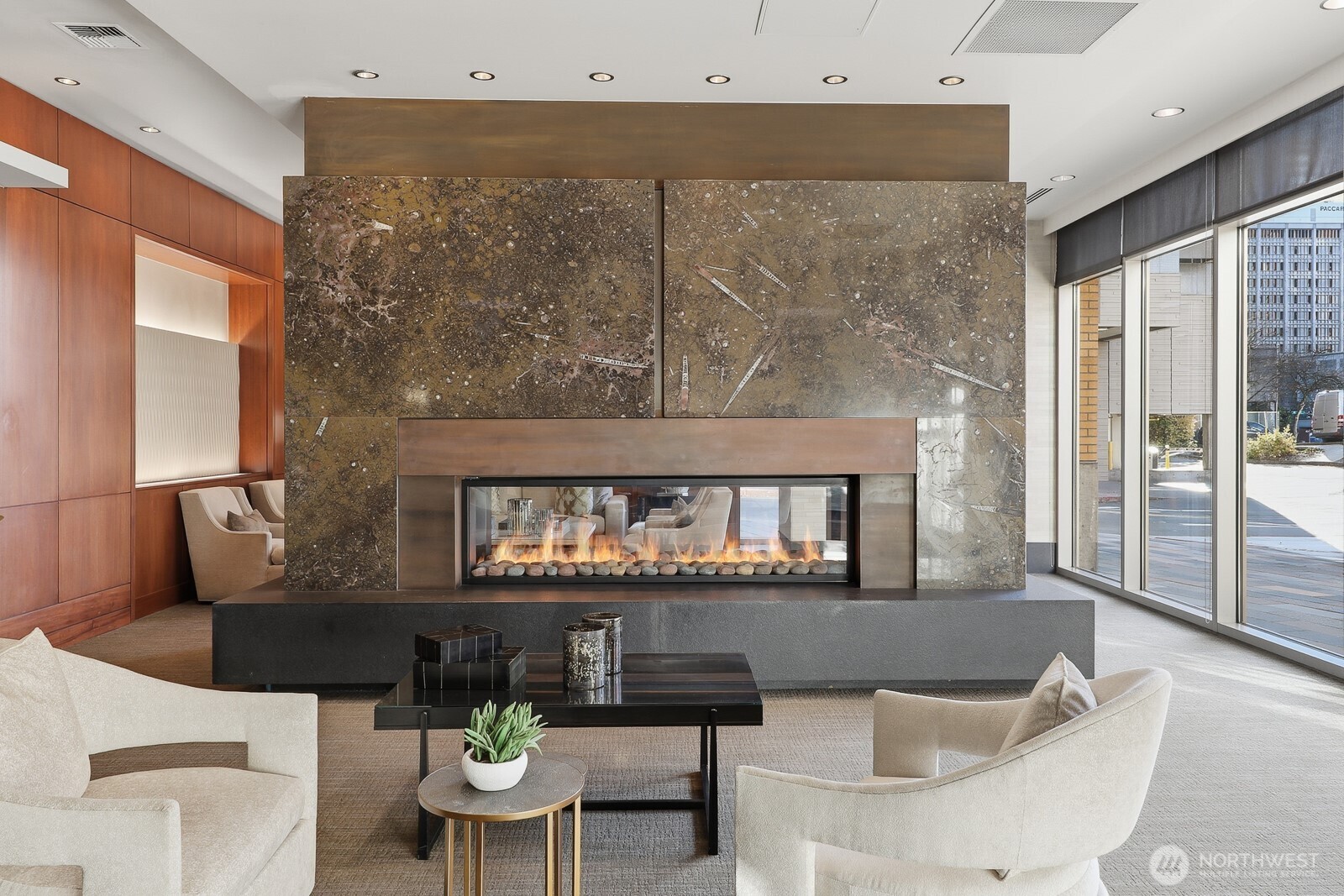 Beautifully designed lobby area with a fireplace and a full-time concierge who manages package security and ensures safe deliveries of your packages.