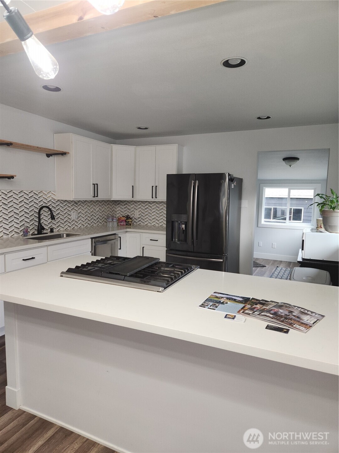 Plenty of room for a dining table and eat-in space from kitchen island.
