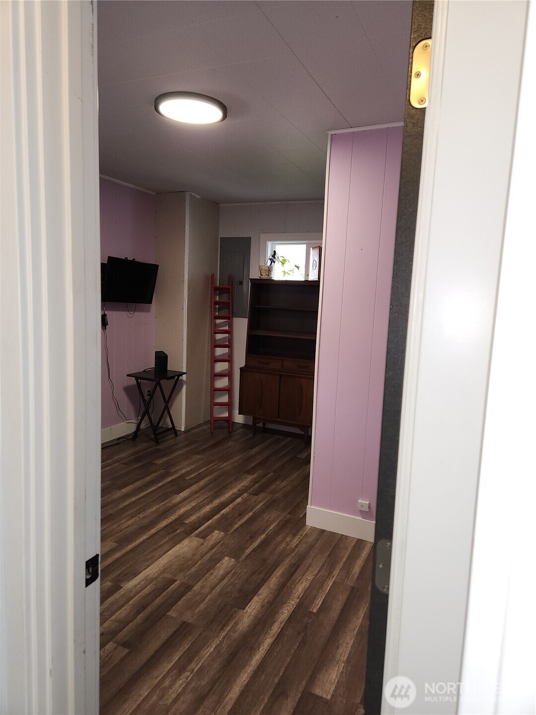 Second room downstairs.