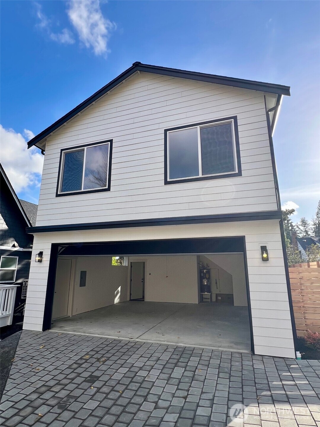 Brand new, detached 2 car garage with studio above!