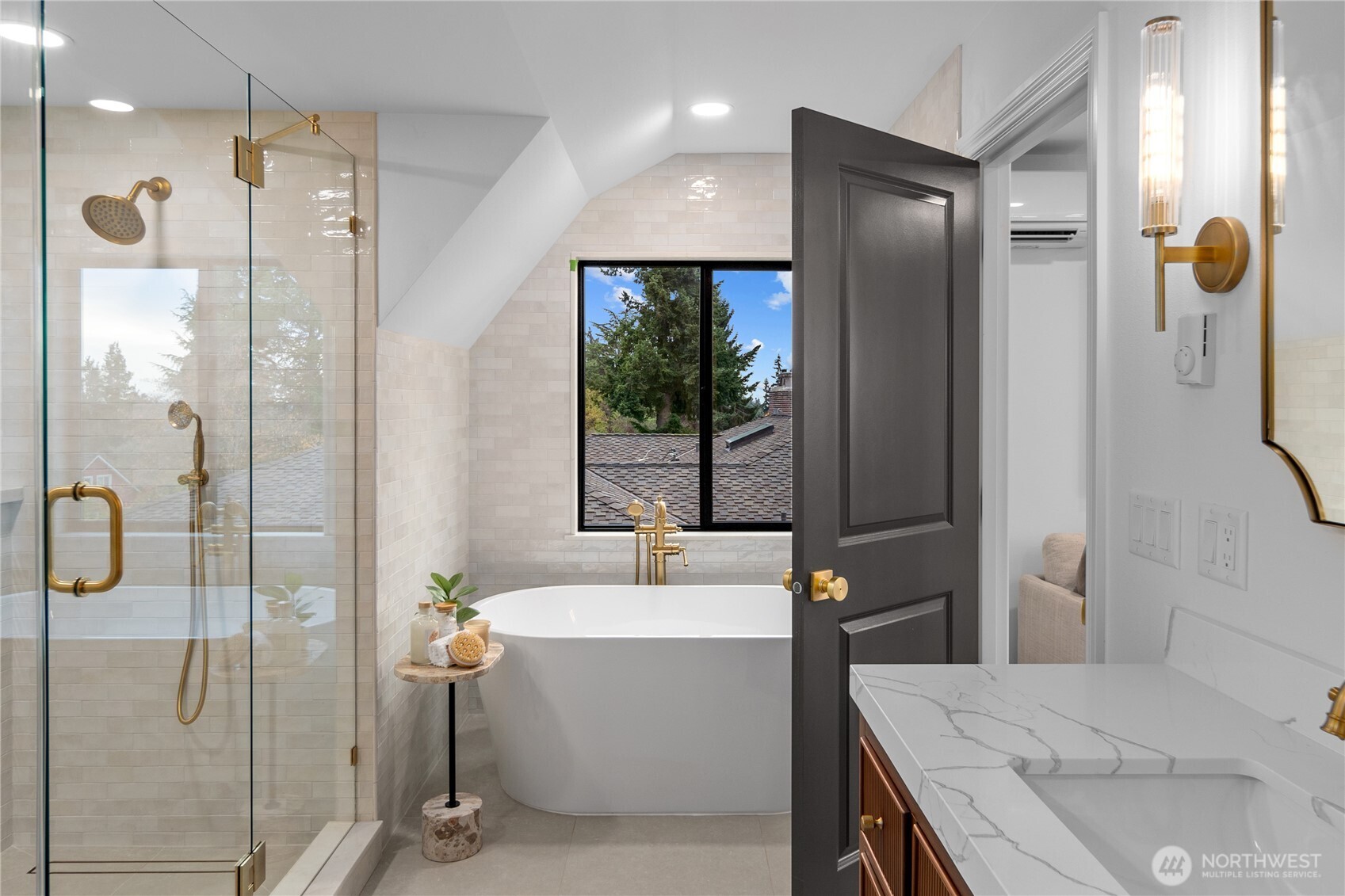 Spa-inspired en suite Primary bath! Ooolala! Featuring a custom double-sink vanity, quartz counters, a luxurious free-standing soaking tub, designer fixtures and premium title.