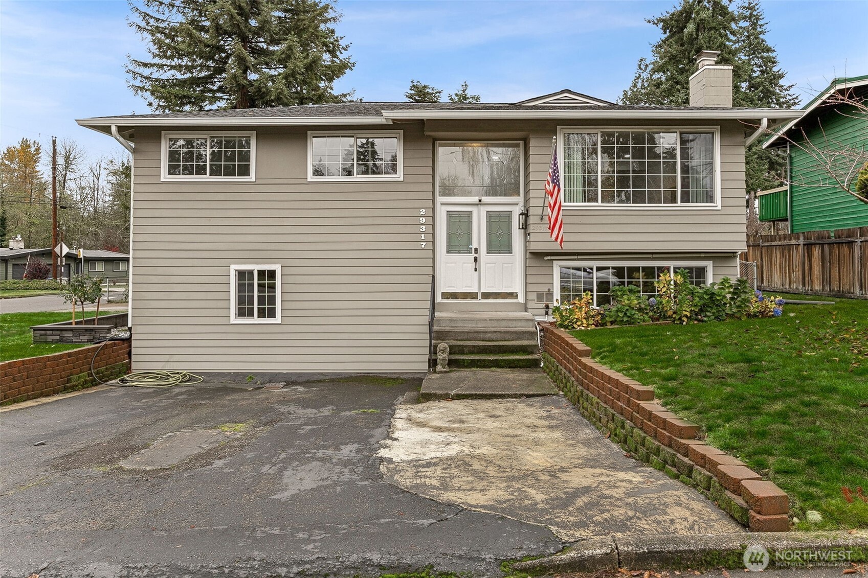 Main living room overlooking kitchen and deck.