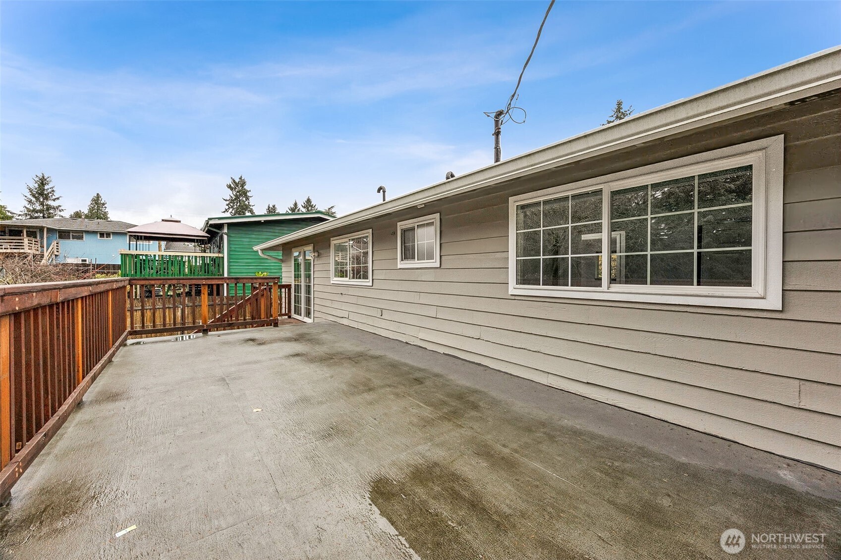 Generous sized almost fully fenced backyard.