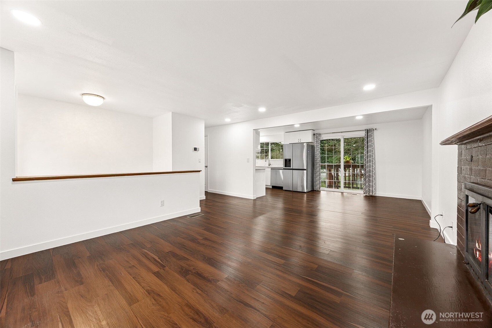 Main living room with fireplace.
