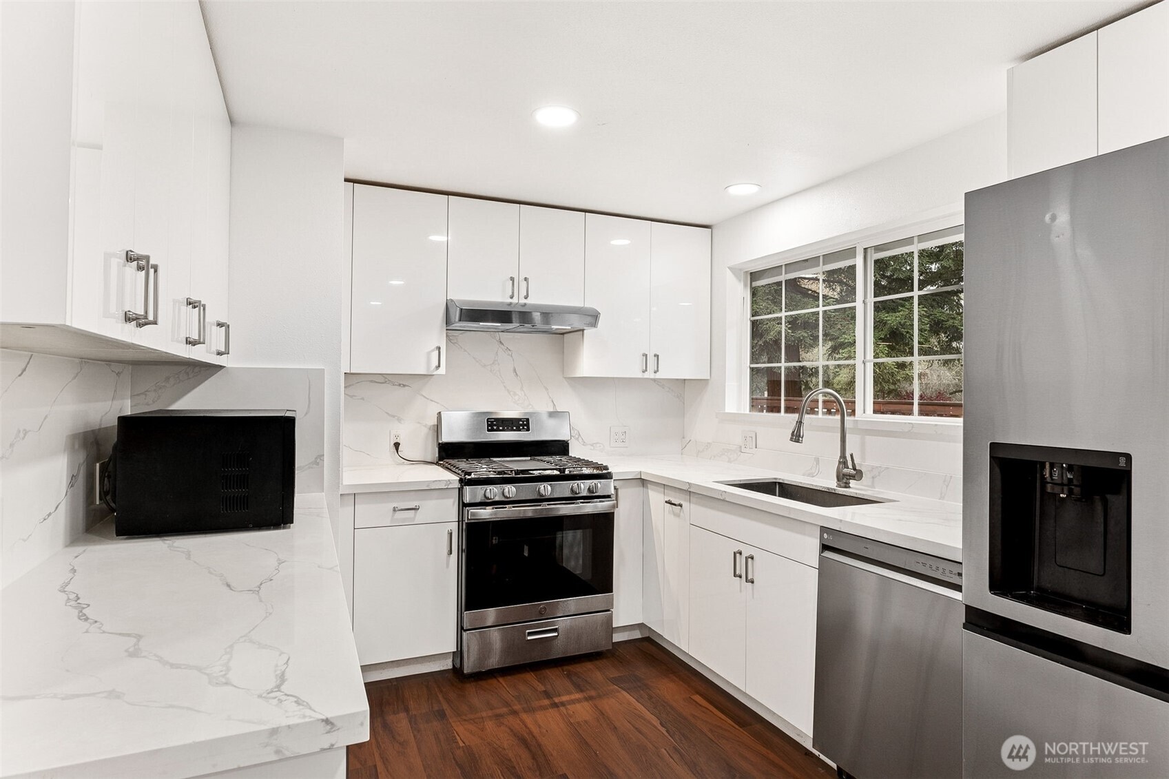 Stairs leading to basement from main living room.