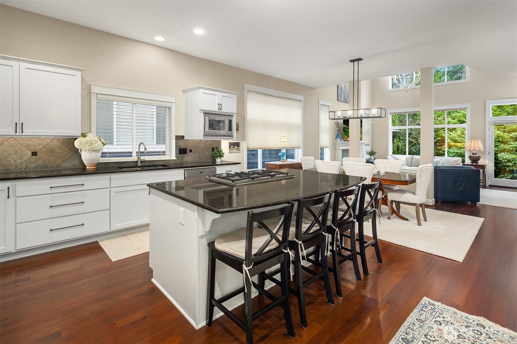High ceilings with walls of windows to private greenbelt