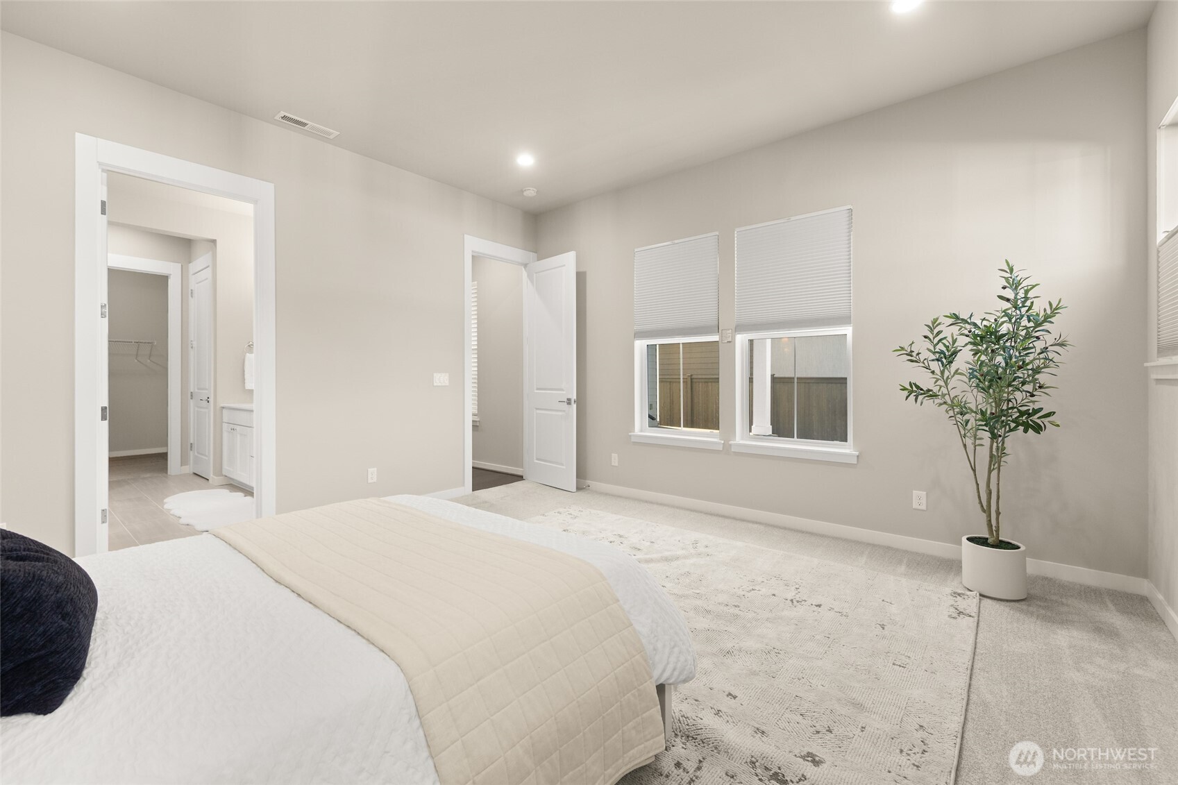 Retreat to your spacious and serene primary suite.