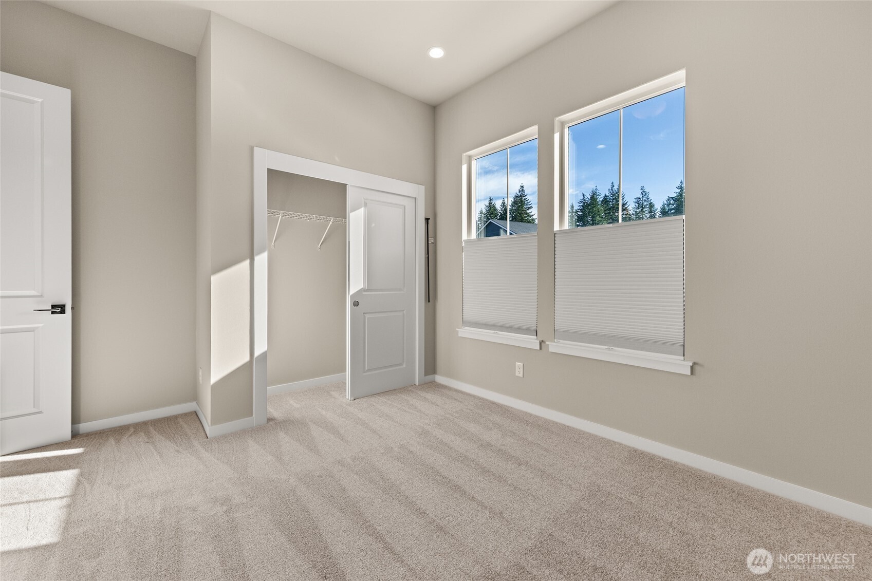 Flexible second bedroom; perfect for guests, hobbies, or a home office.
