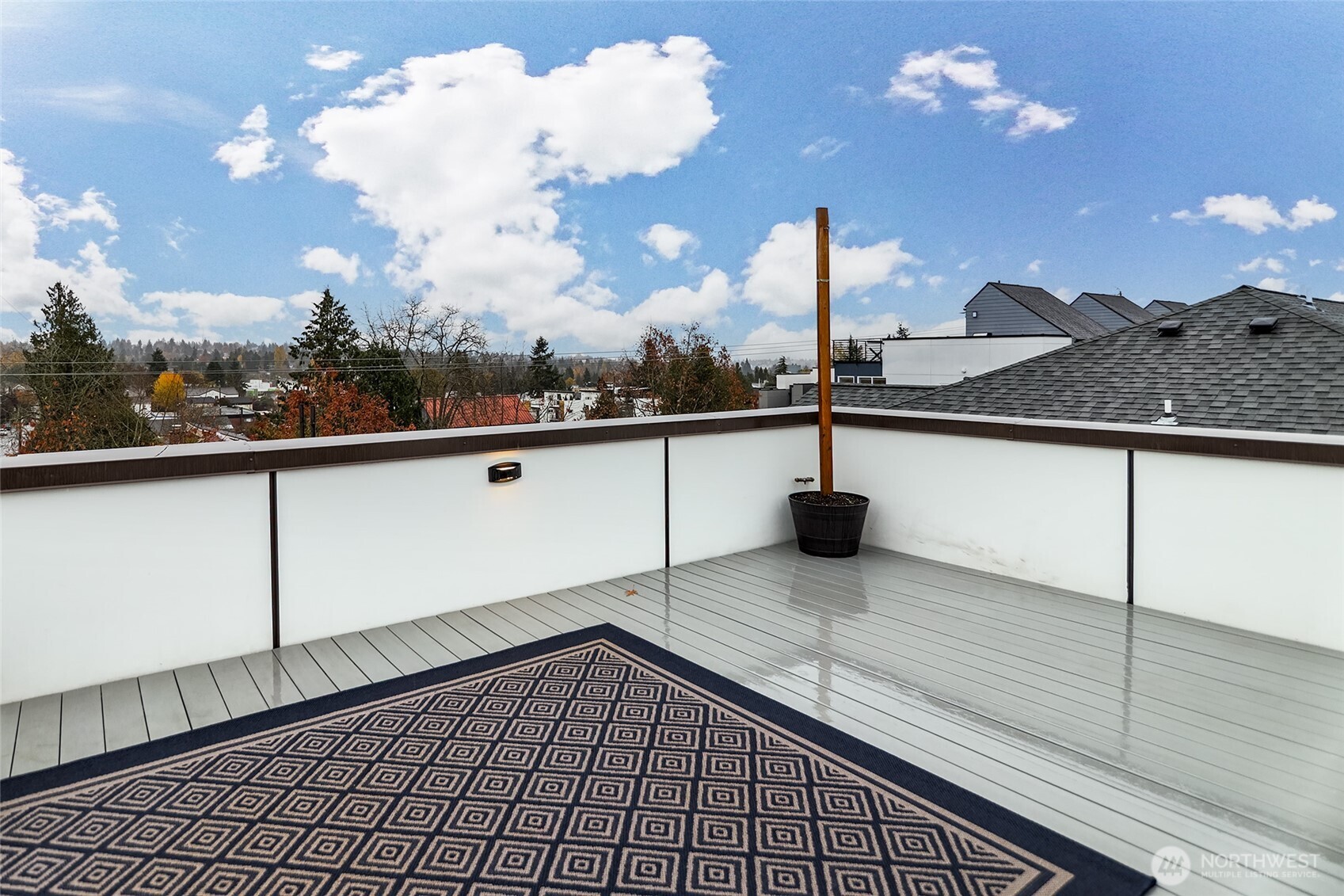 Enjoy outdoor living with this spacious rooftop deck—perfect for BBQs, entertaining guests, or cultivating your own garden retreat. Plumbed with a gas line, it's ready for your grill or cozy fire pit gatherings.