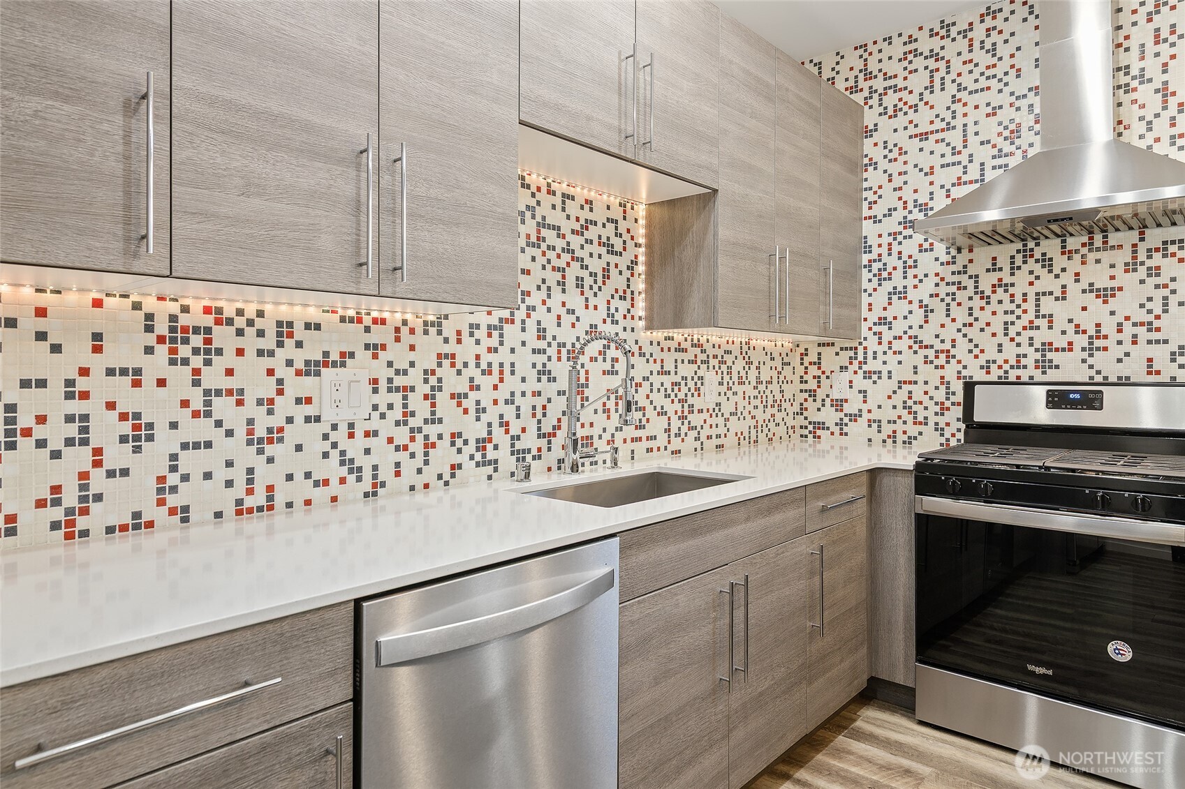 Beautiful Quartz countertops, lots of counter space, gas cooking.