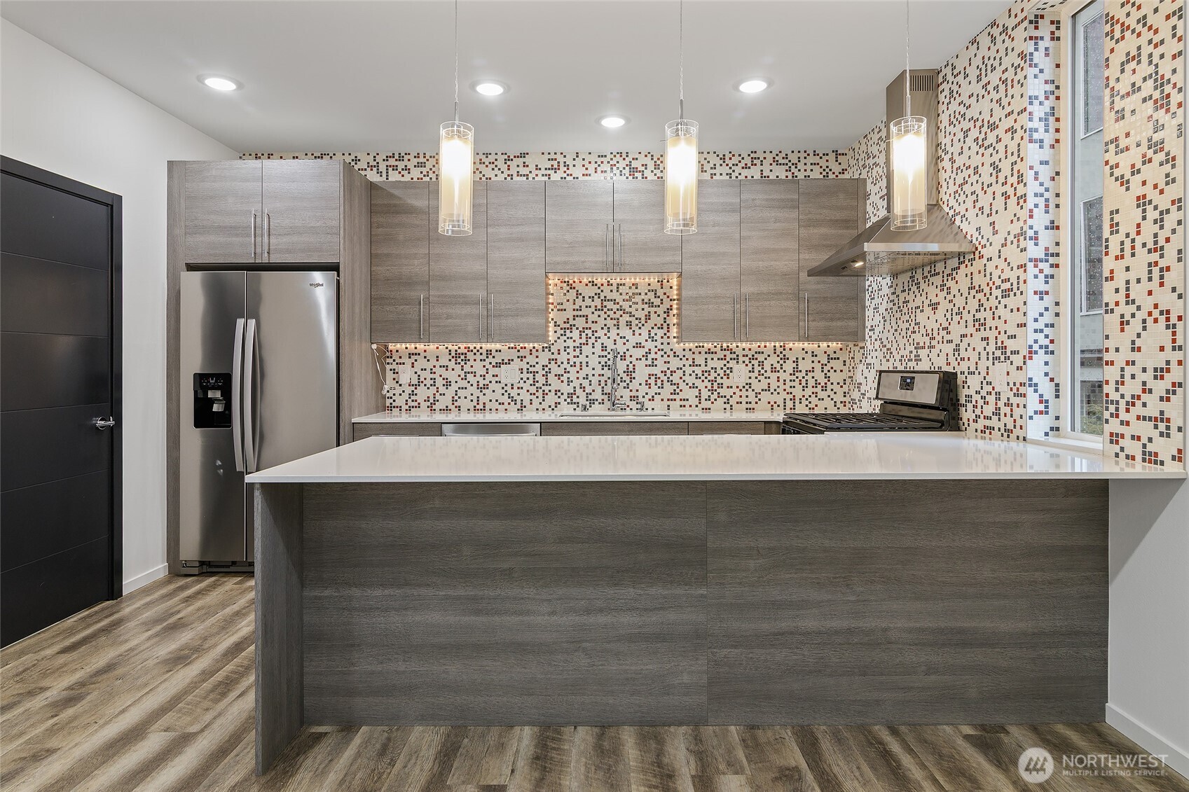 Large kitchen island with bar for seating