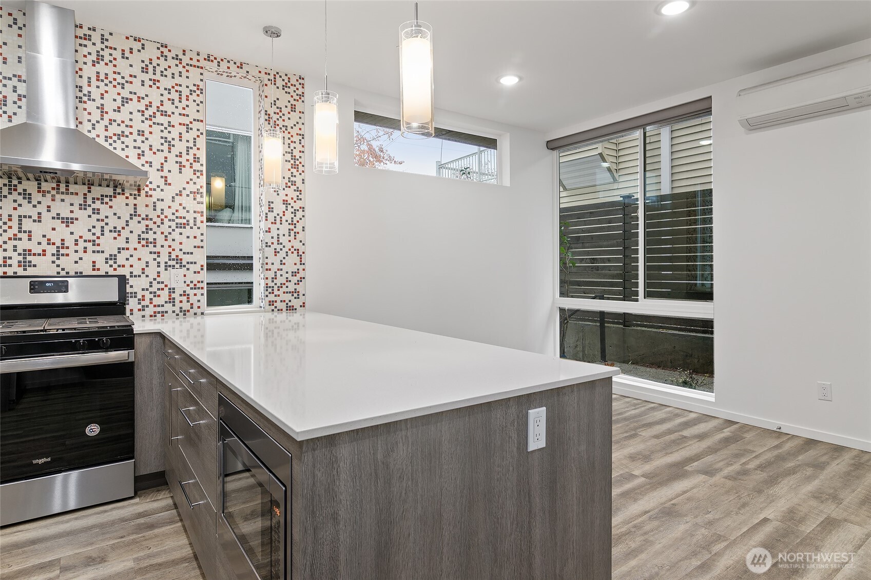 Modern, natural light, high ceilings, floor to ceiling windows, efficient mini-split heating and cooling, and on-demand tankless water heater for modern comfort.