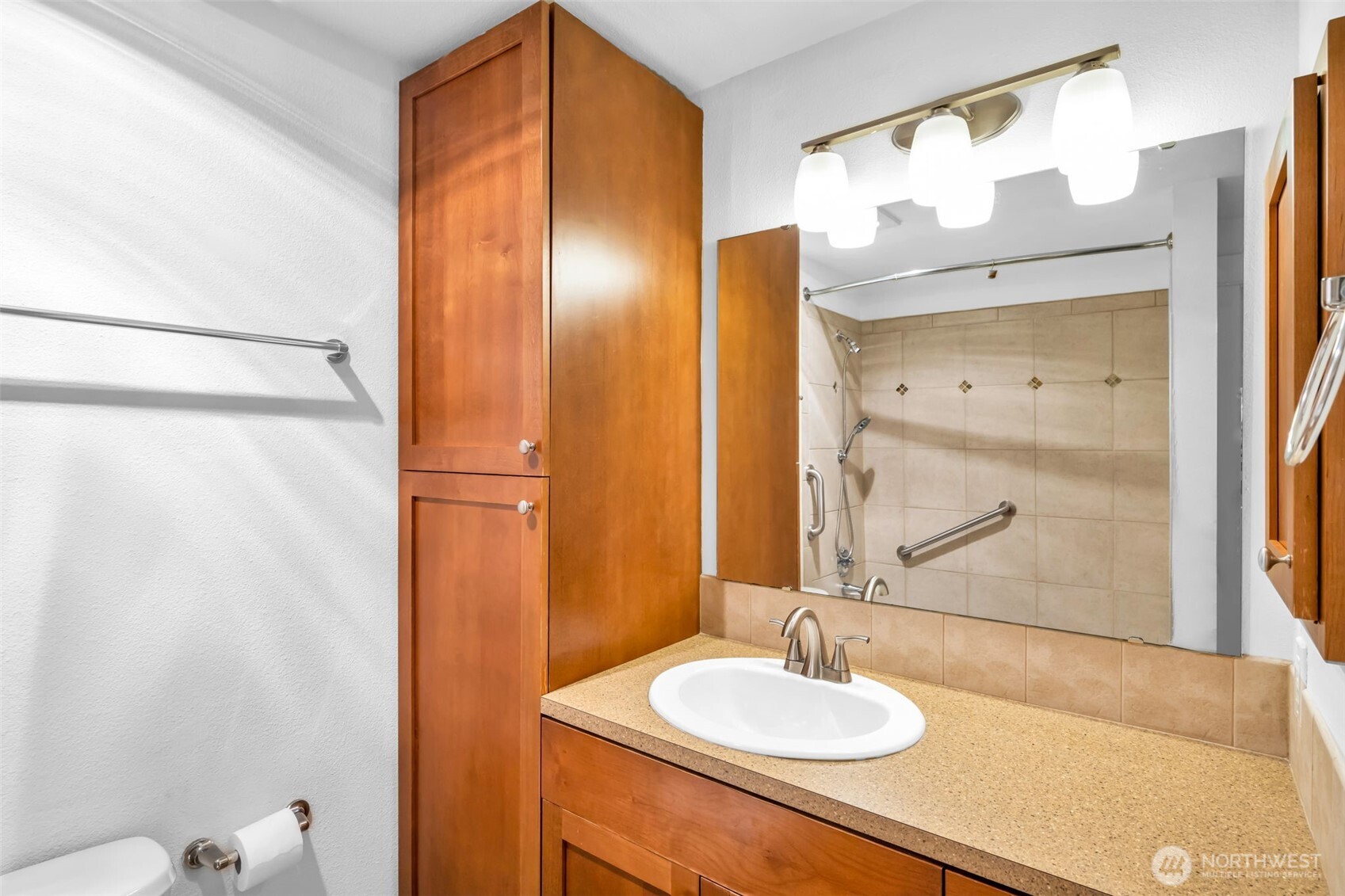 Great space to get ready for the day. Bathroom has been freshly painted and has plenty of storage. Tile accents and built in medicine cabinet.