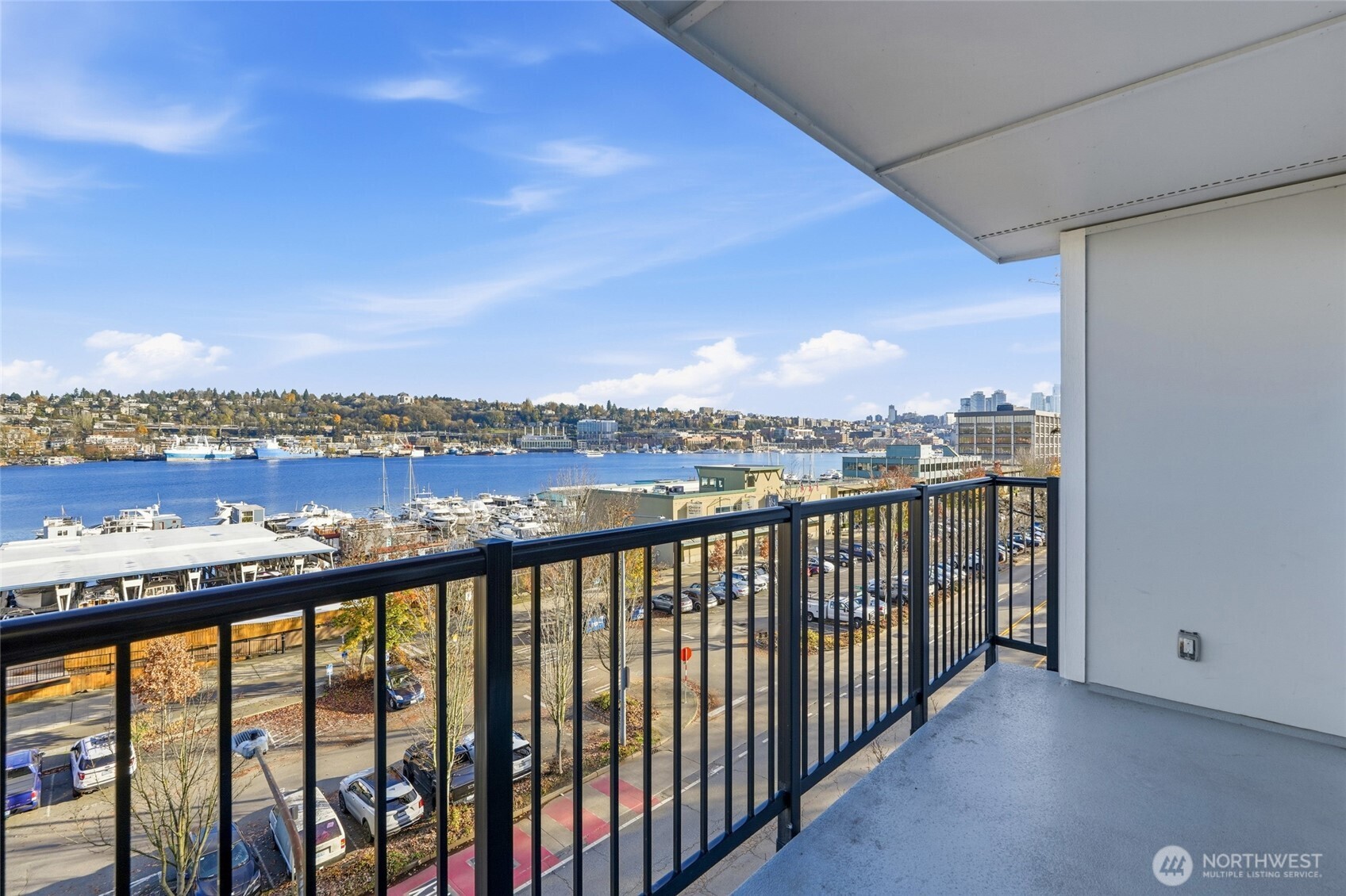 Balcony captures the perfect blend of city energy and serene water views.