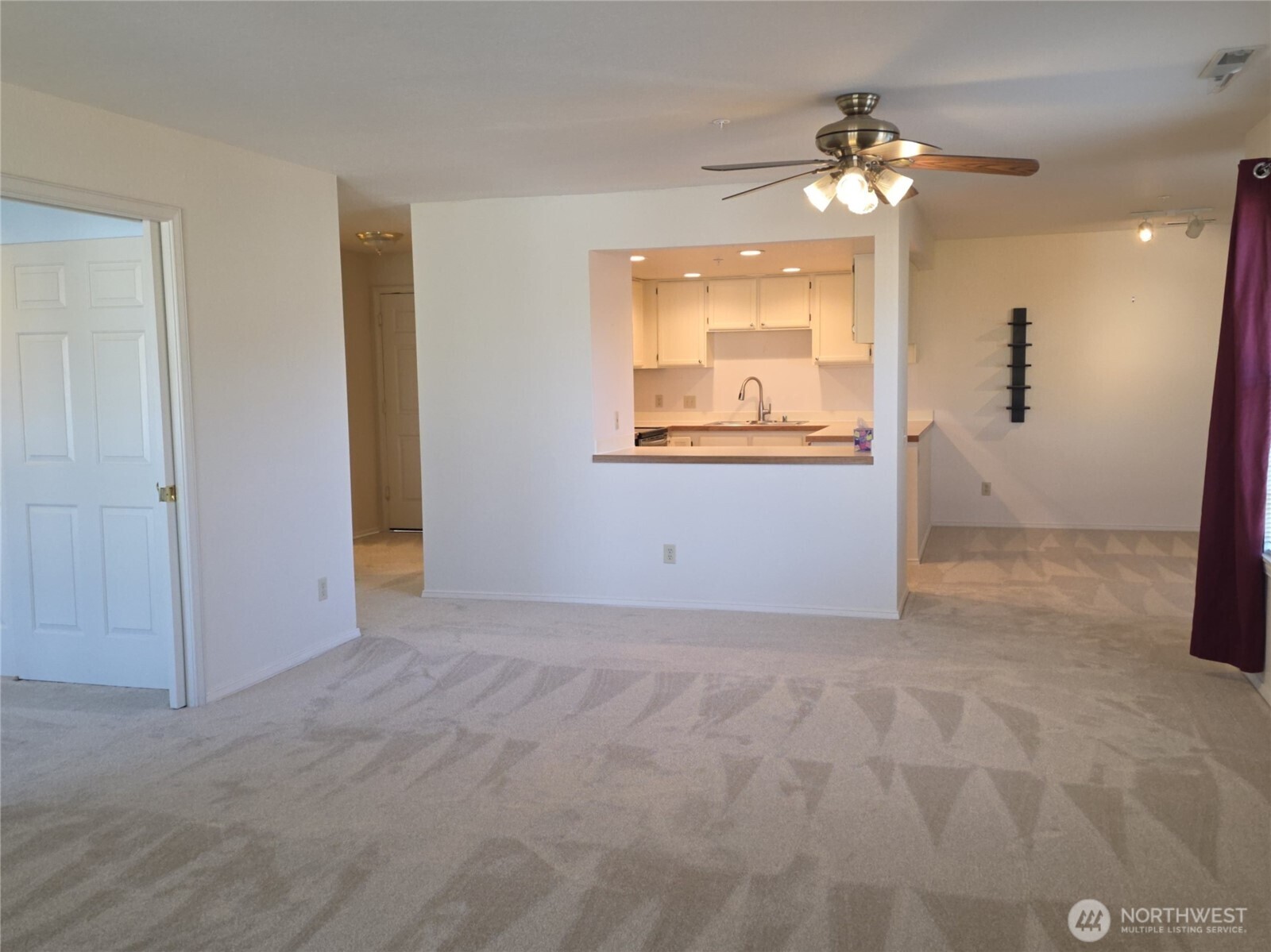 Exit the unit at top left hallway