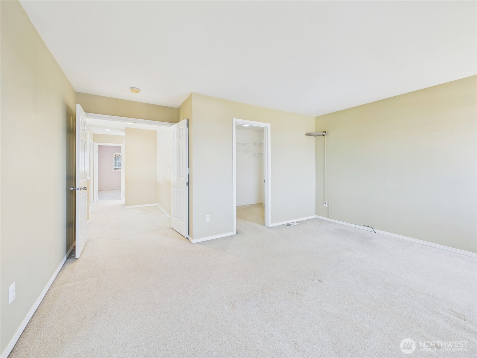 Ensuite bedroom with walk-in closet