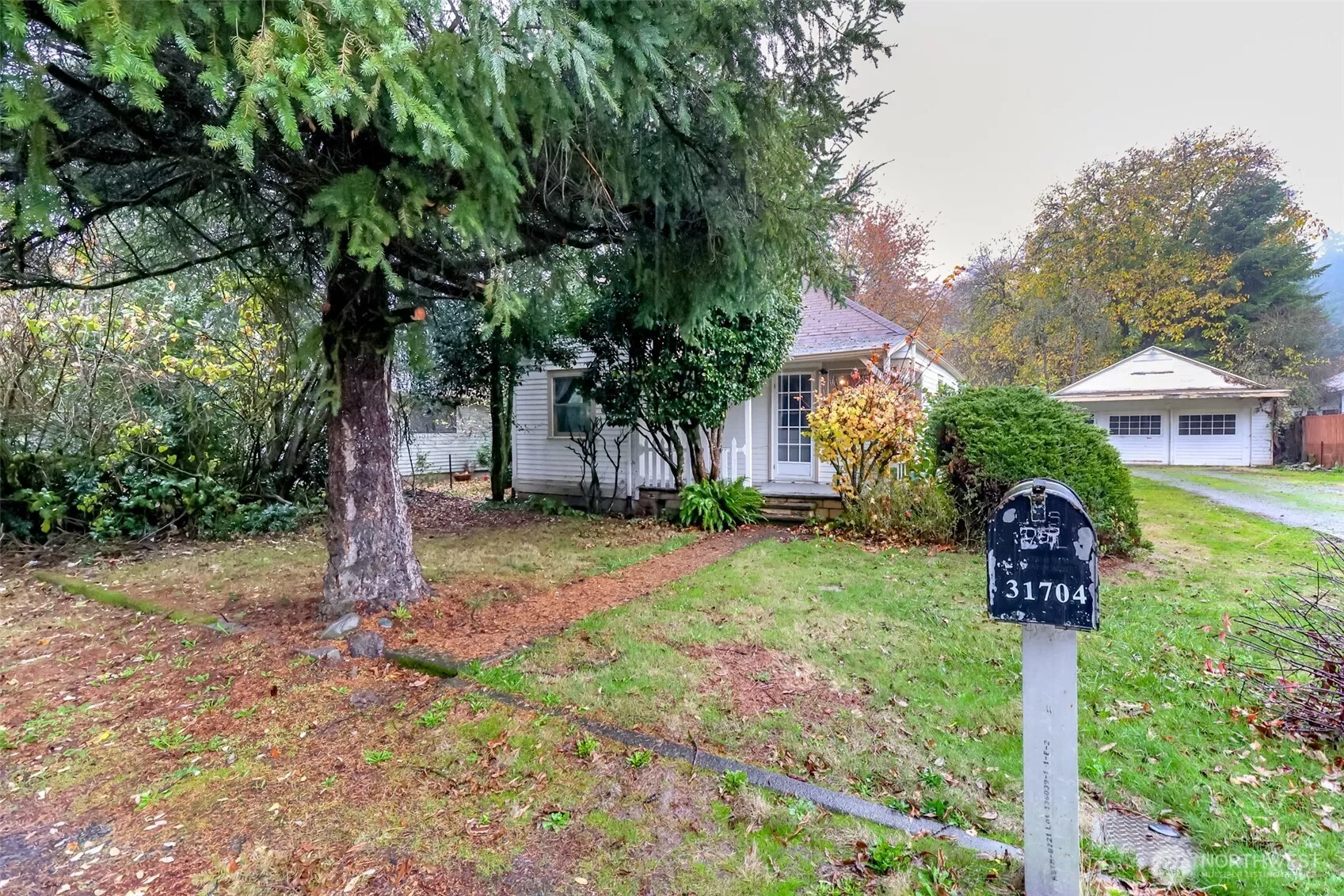 Front of home with detached garage
