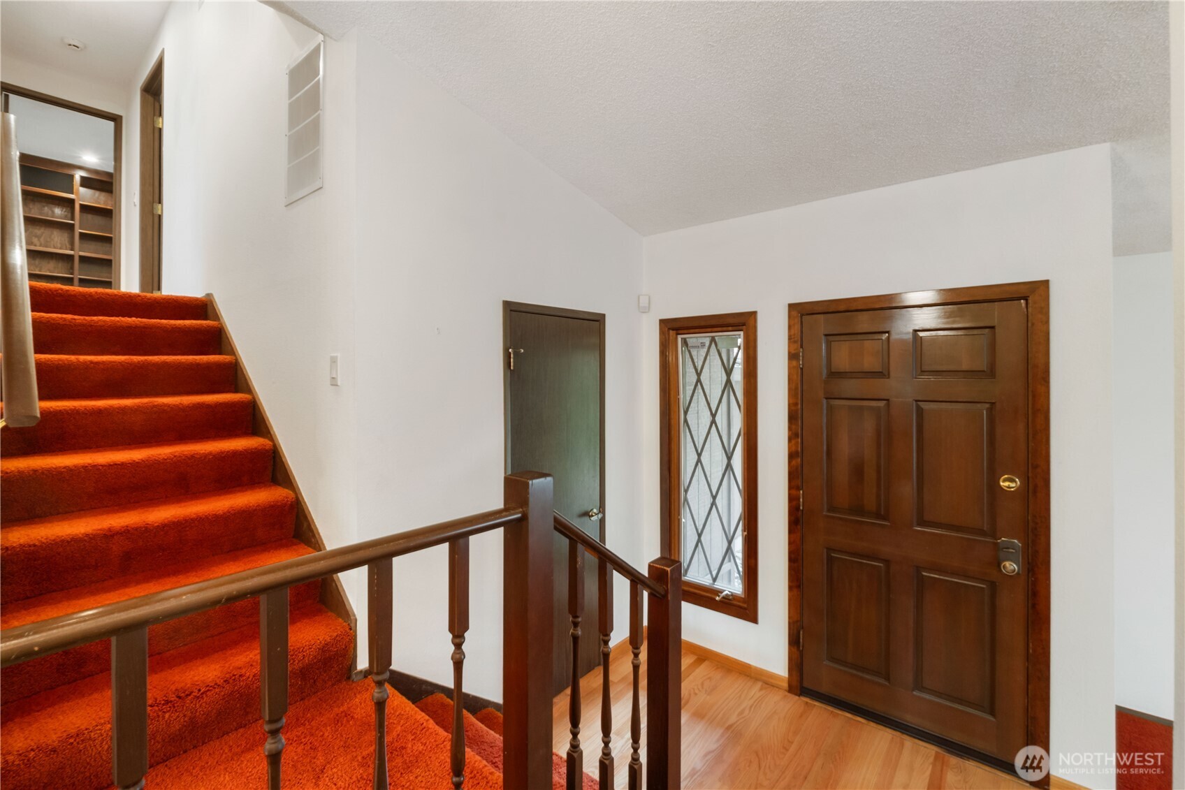 Entry on main level, with staircase leading to 2nd level, where Bedrooms are located.