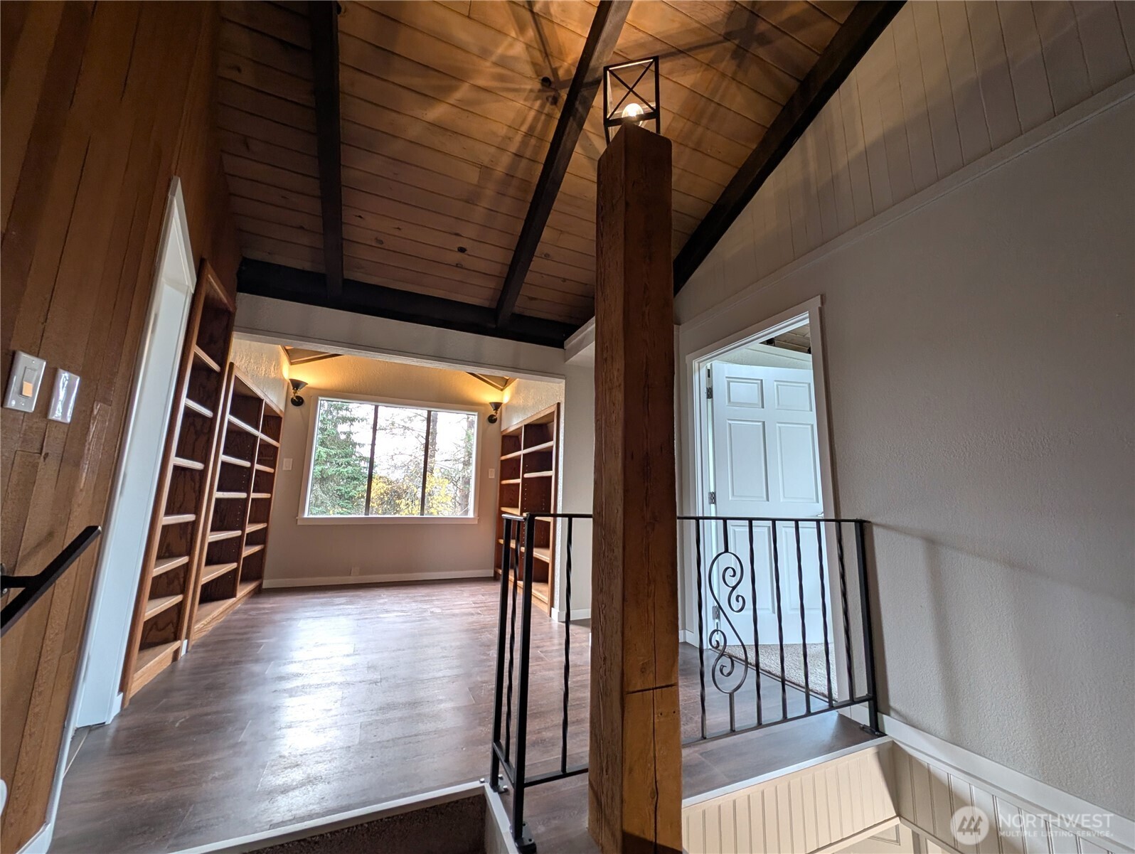 Study/office/library?  Cool vaulted area w/built-ins.