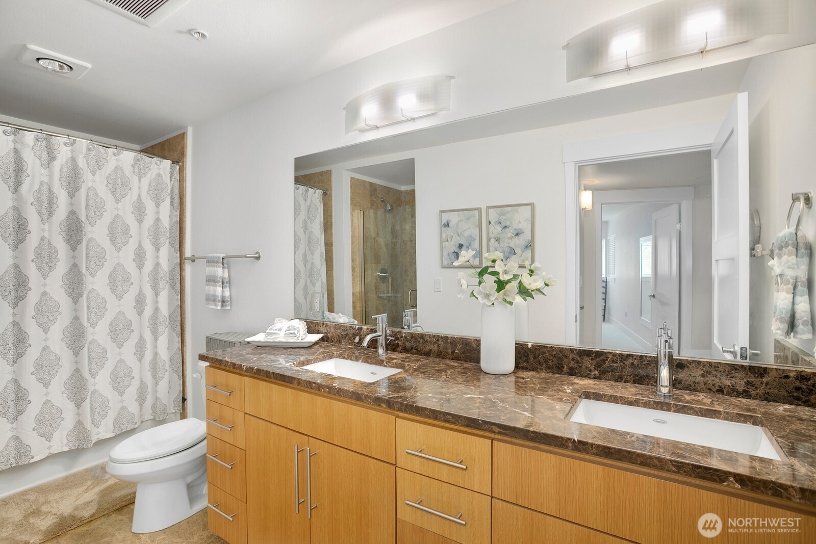 Dual sinks is part of this 5 pc bathroom.