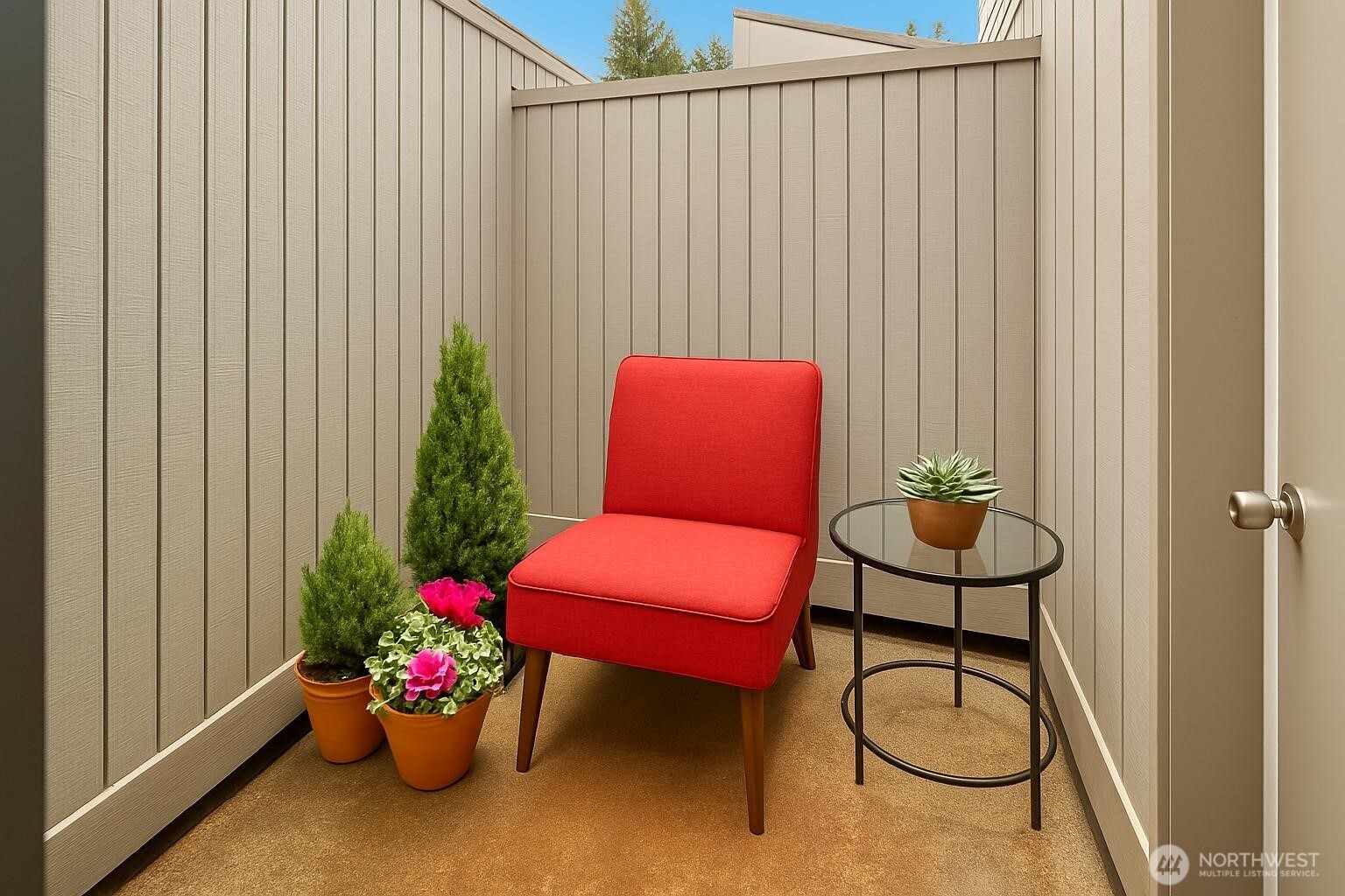 Private patio off Bedroom #1 offers room for morning yoga, coffee, or your green thumb!  (Virtually Staged)