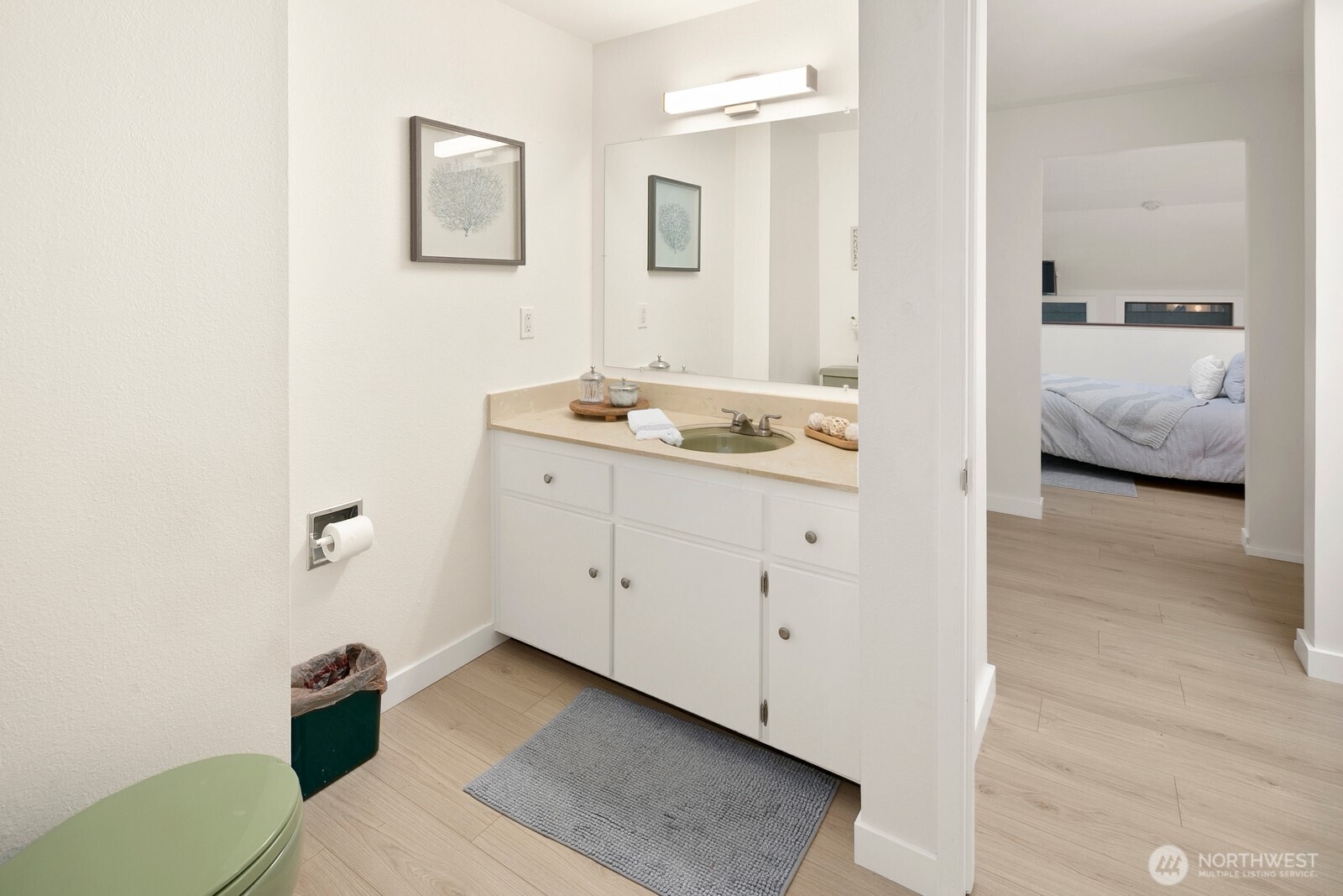 Full bathroom upstairs with sink, toilet, shower/tub.  The 2nd bedroom has its own private sink.