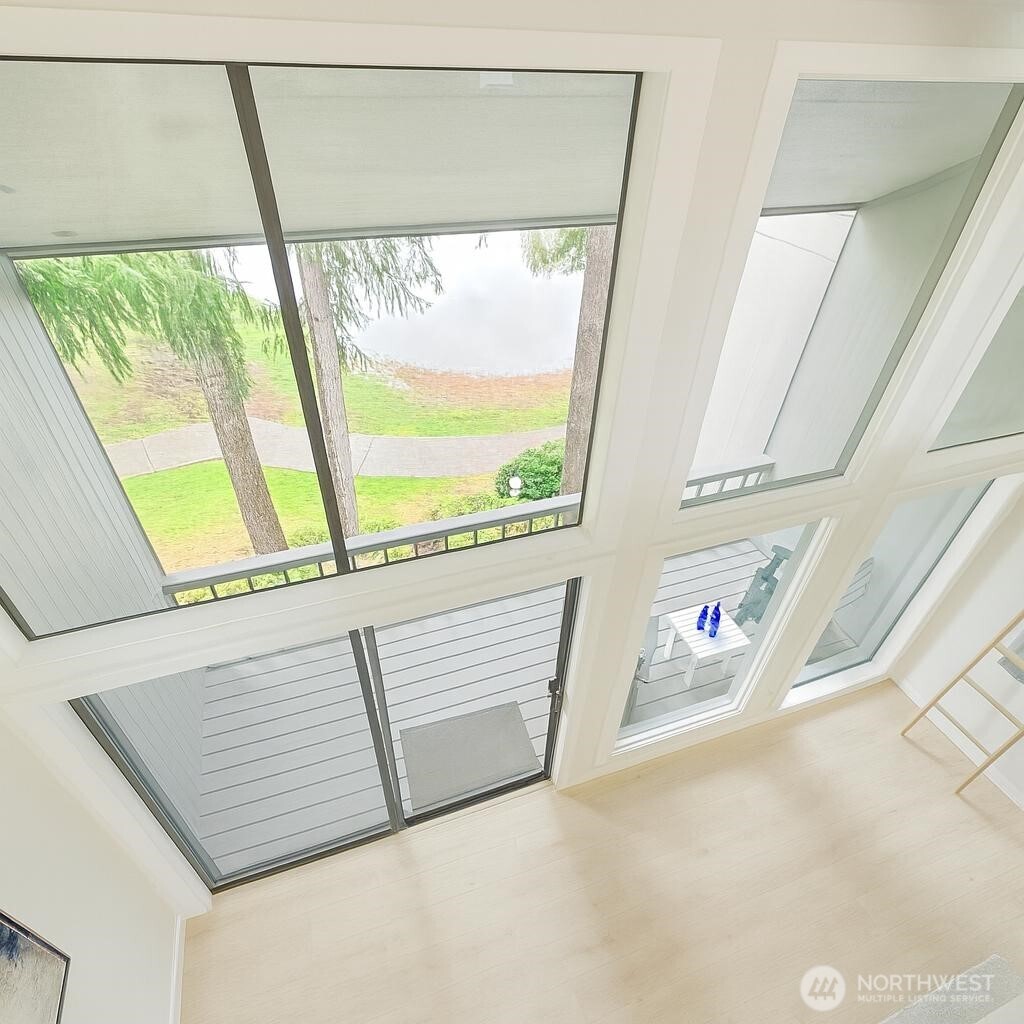 Spectacular 2-story wall of windows allows you to enjoy your front row view of the water, from both stories of the home.