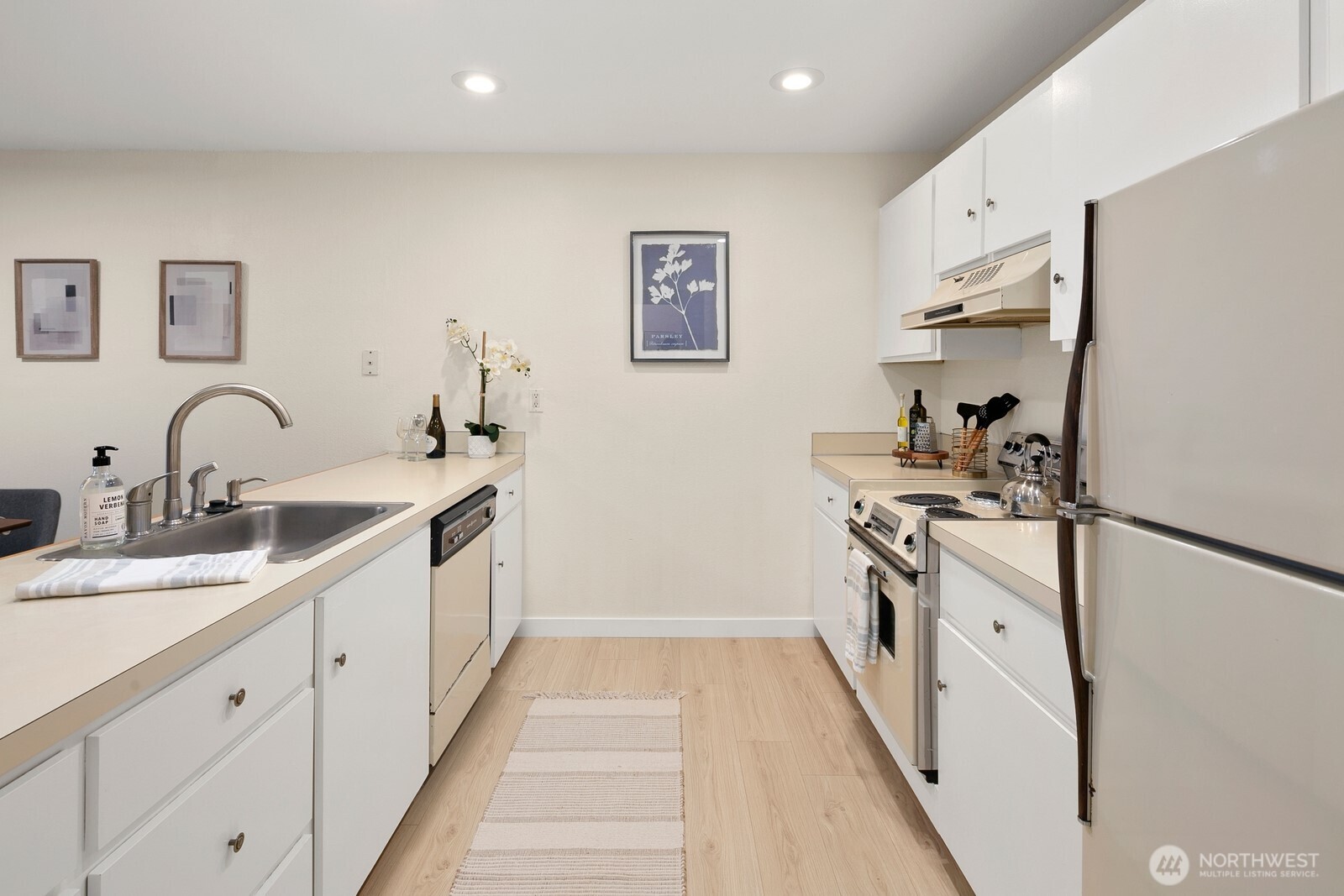 Simple kitchen provides plenty of storage and counter space.  If you use your imagination to update this space, you'll be able to create instant equity!