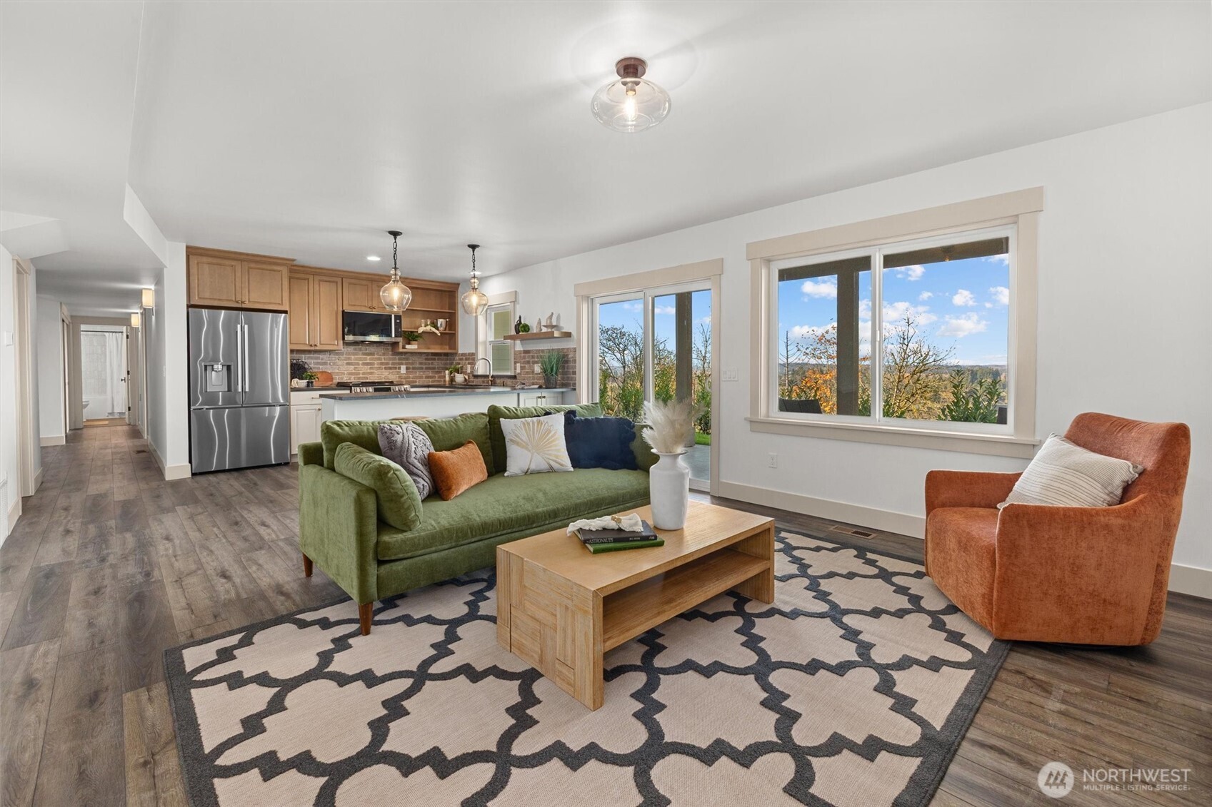 Amazing lower-level features full kitchen with bar seating, family room with custom fireplace, 2 large guest bedrooms, full size bath and utility room! Could easily be a MIL for multigenerational living!