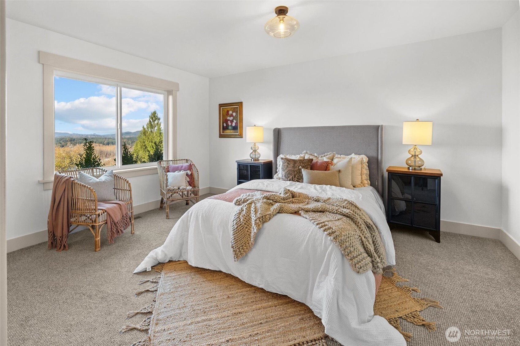 Spacious lower-level guest bedroom (1 of 2 identical rooms) with amazing territorial views!