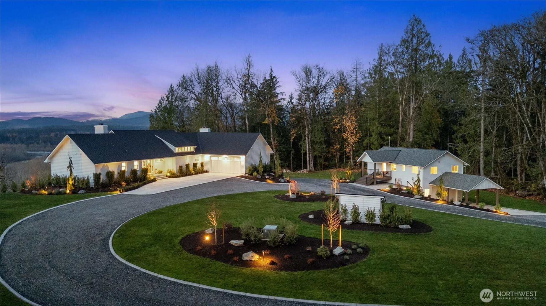 Nestled down a private, serene driveway with custom iron gate with electronic keypad.