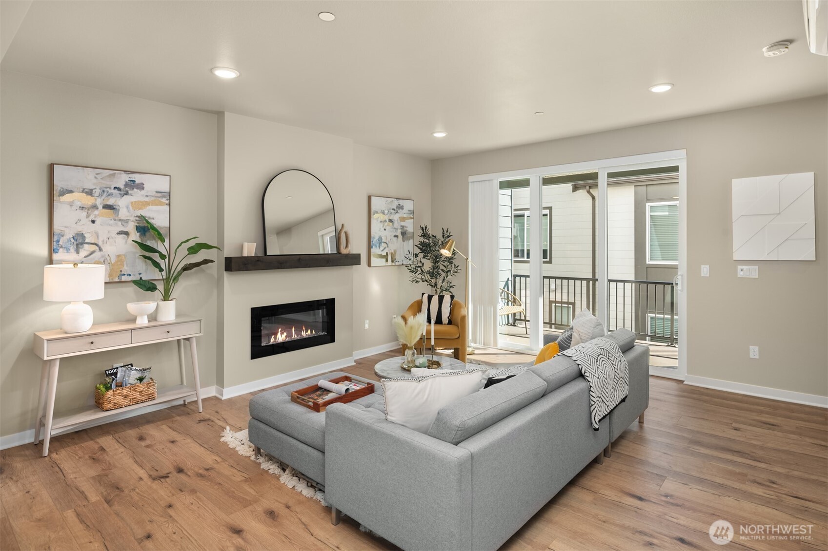 Living room opens up to large covered and heated deck for year-round enjoyment!