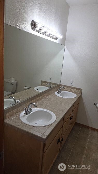 Primary Bathroom with double sinks