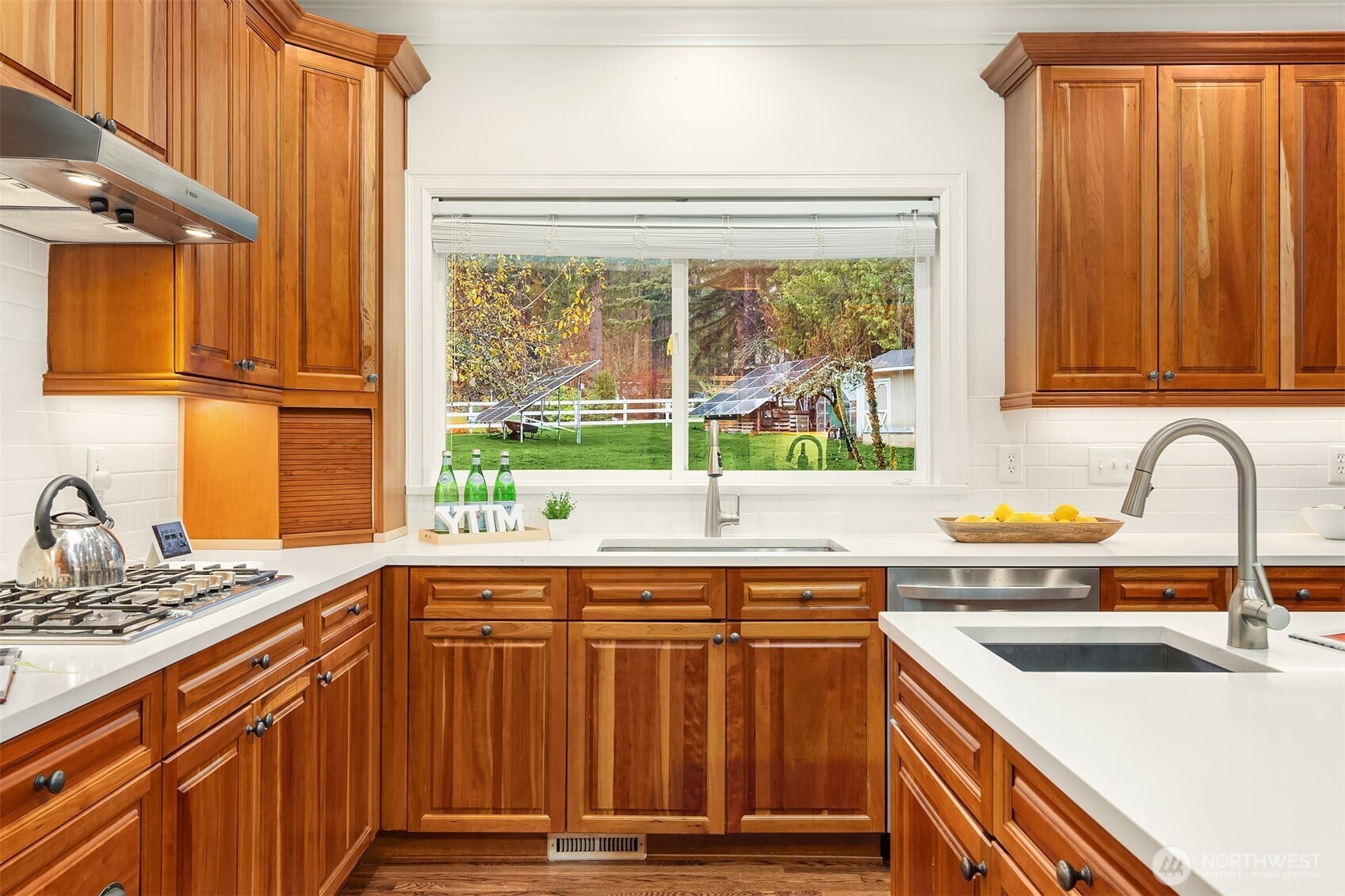 Better than new refinished real cherry wood cabinets, new quartz counters.