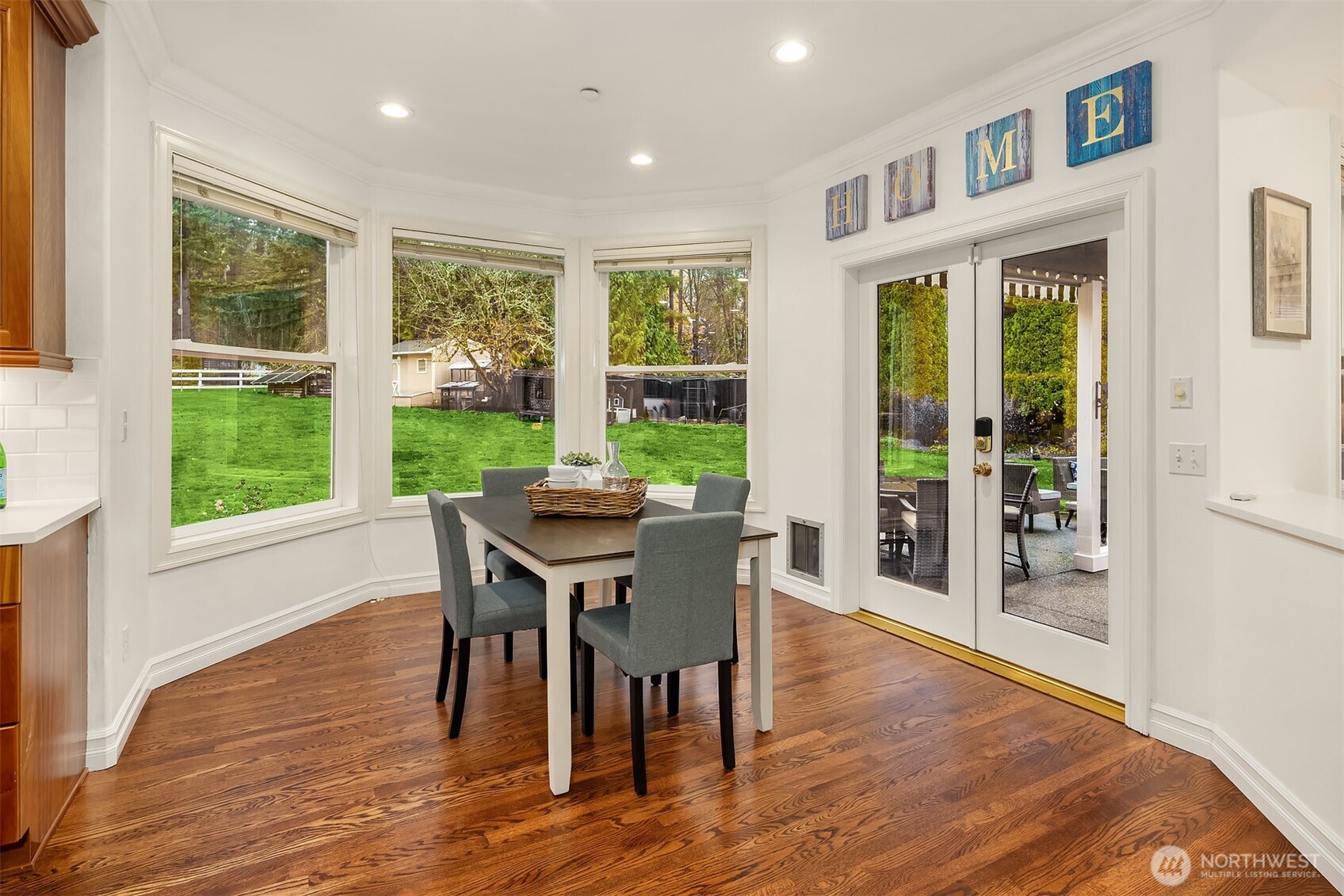 Kitchen opens to the formal dining room and features a pantry.