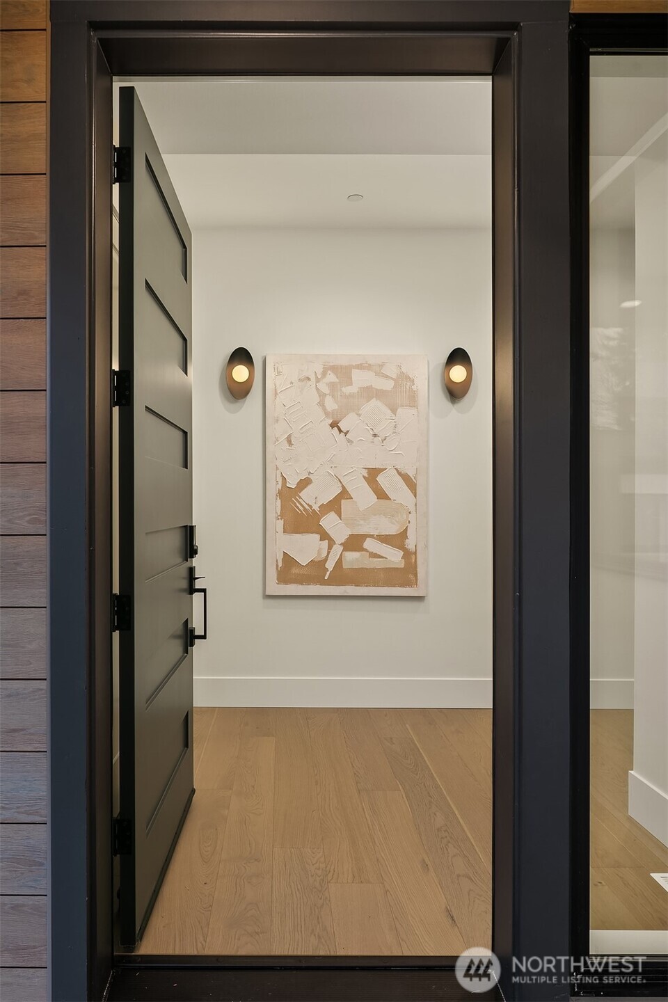 Step through a dramatic 10-foot front door that sets the tone for the luxury that unfolds inside.