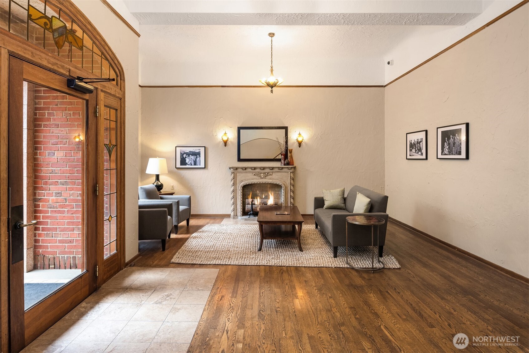 Charming lobby entrance accessed via front courtyard.