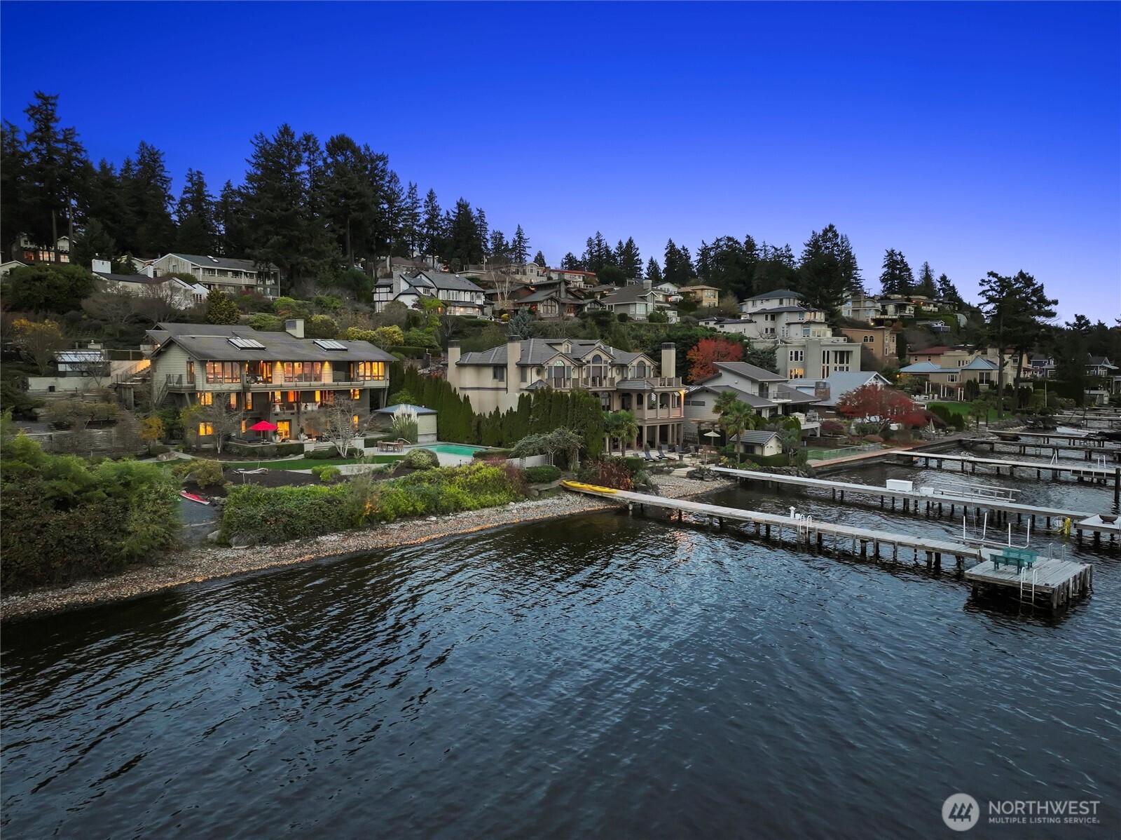 Set on an expansive 31,714 sq. ft. (.728 acre) estate on Kirkland’s coveted Juanita Point, the property comprises an 18,025 sq. ft. primary lot with 80 feet of waterfront and an additional 13,689 sq. ft. adjoining vacant waterfront lot with 81 feet of shoreline