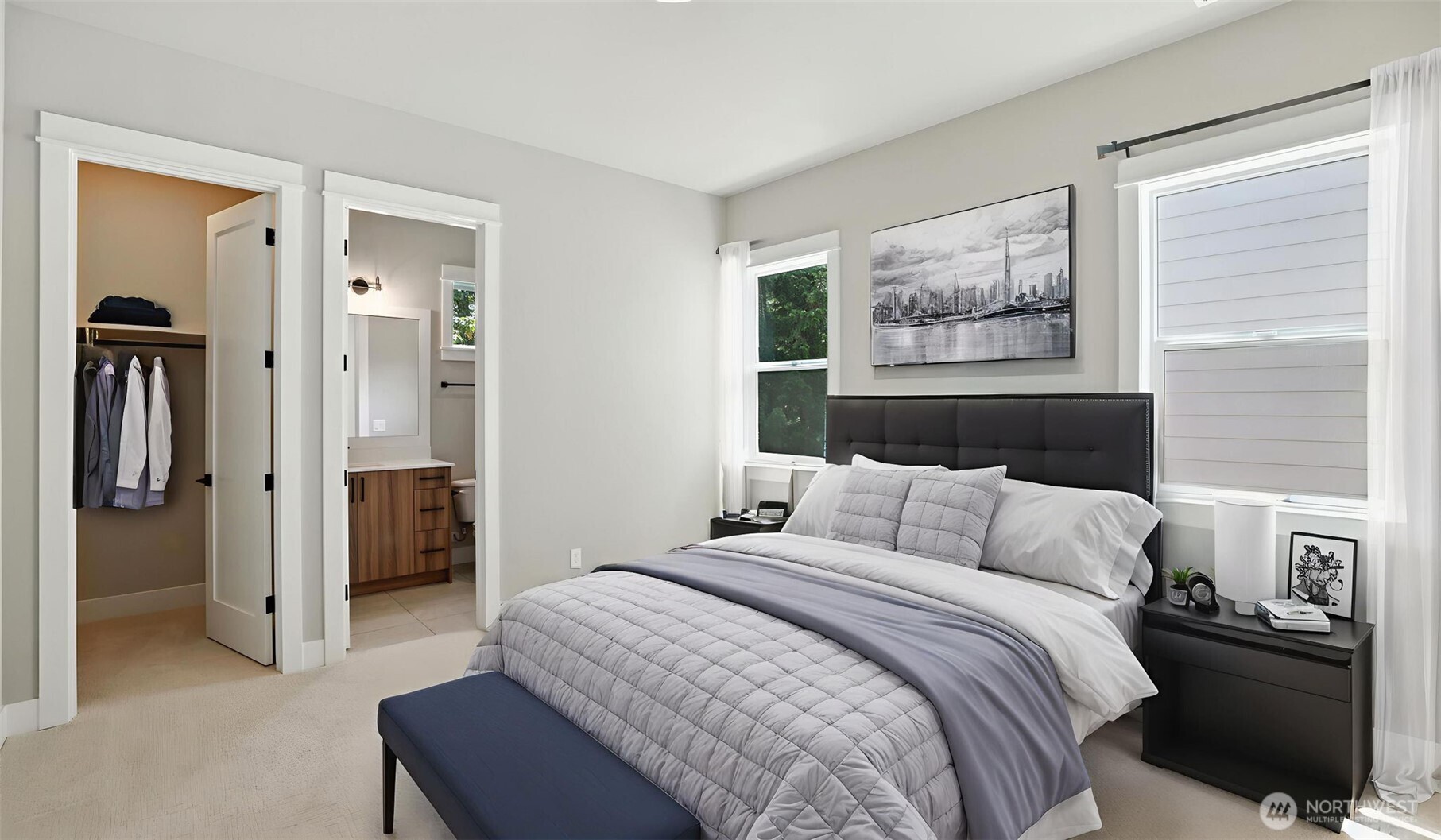 Main Level Guest Suite, complete with a 3/4 Bath, is ideal for multi-generational living arrangement, or extended stay guests. Virtually staged.