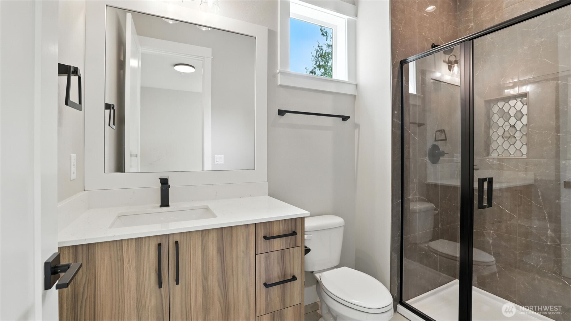 Main Level Guest Bedroom Suite's 3/4 Bath