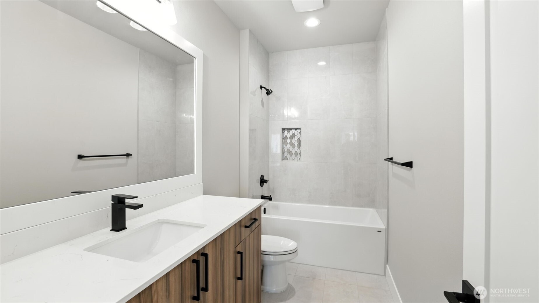 Guest Full Bath on the Upper Level.