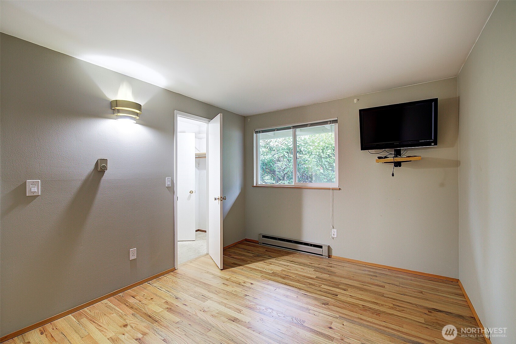 Primary bedroom has a walk-in closet that connects to the full bathroom.