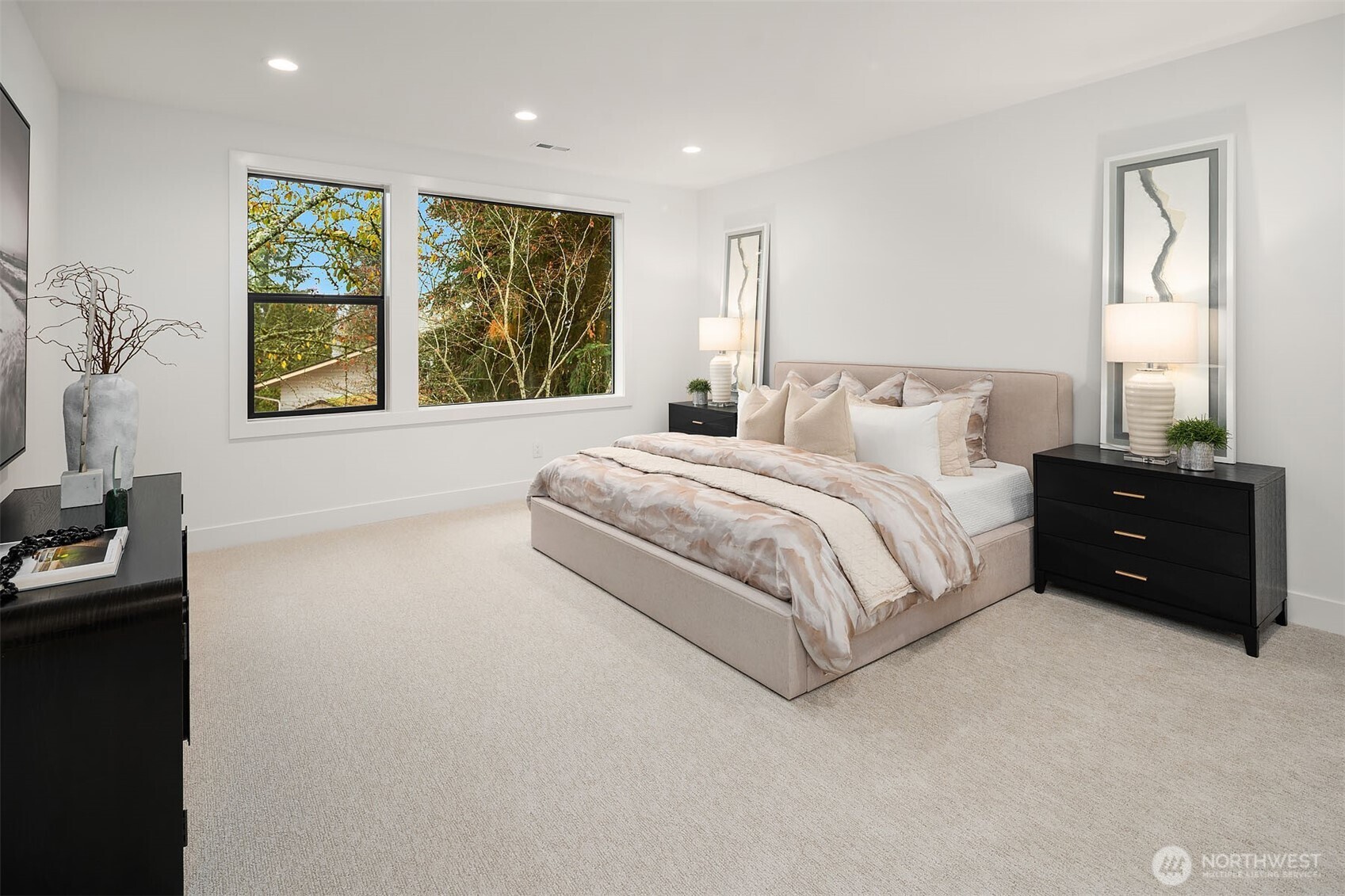 Designer primary suite with five-piece bath with heated floors